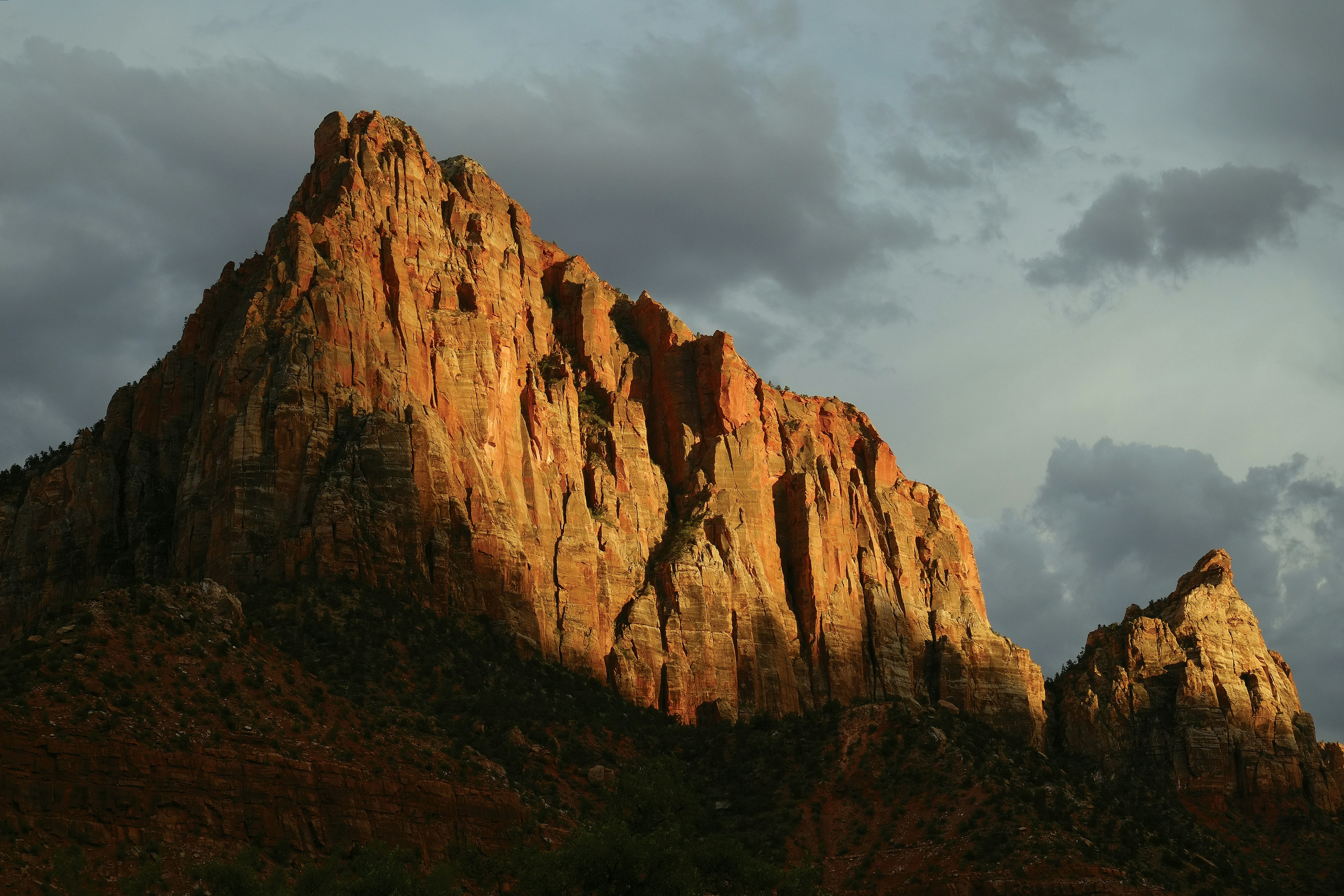 Sunlit Red Rock Mountain Peak