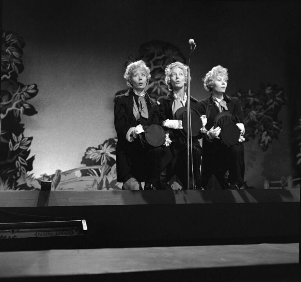 Three Female Performers on Stage