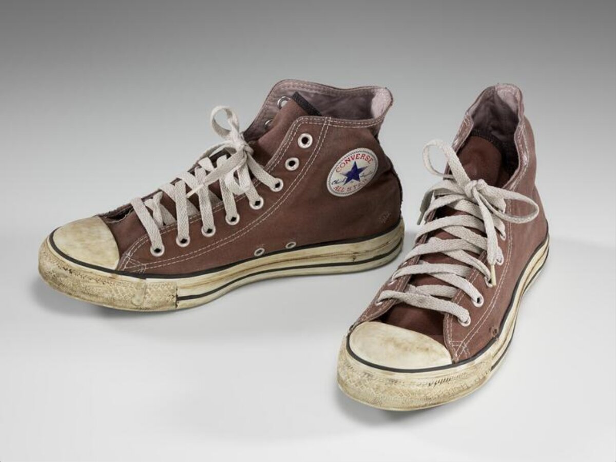 Worn Brown Converse High Top Sneakers