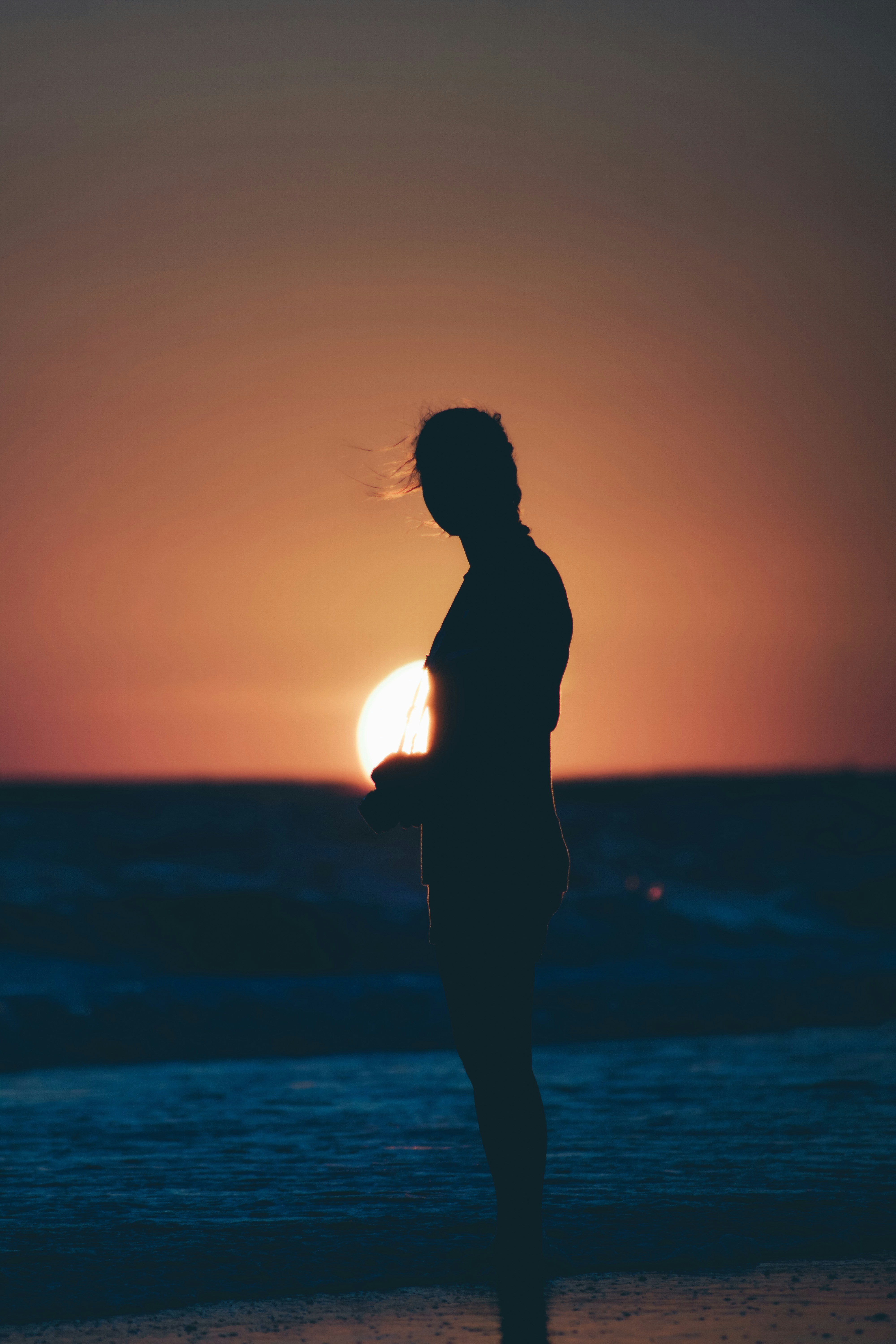 Person Silhouette at Beach Sunset