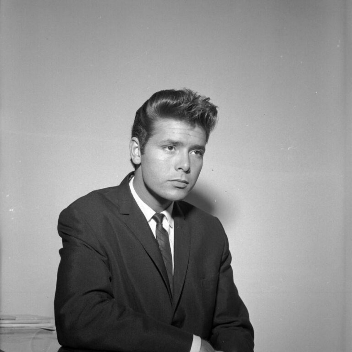 Studio Portrait of Young Man in Suit