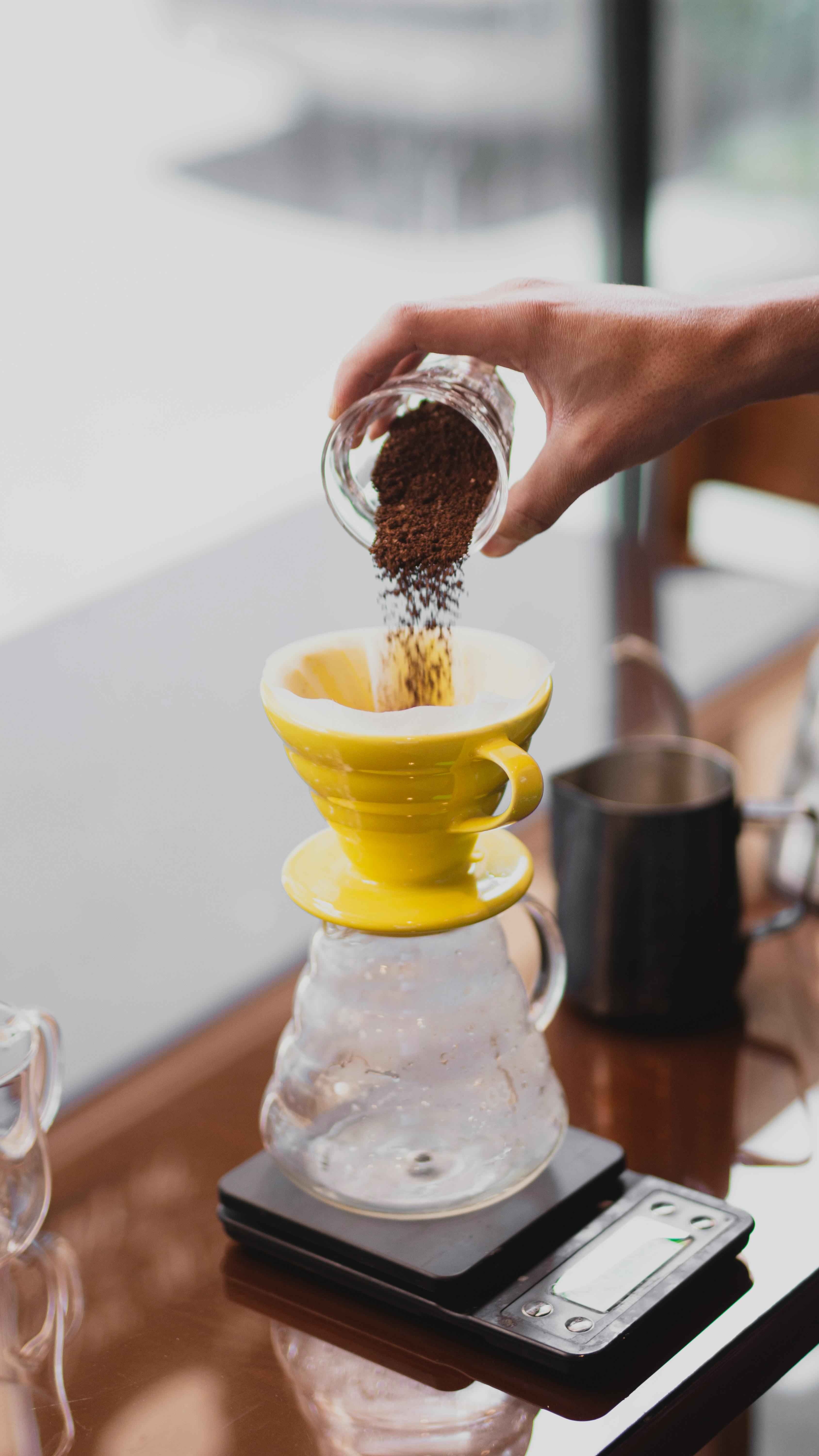 Adding Coffee Grounds for Pour Over Coffee