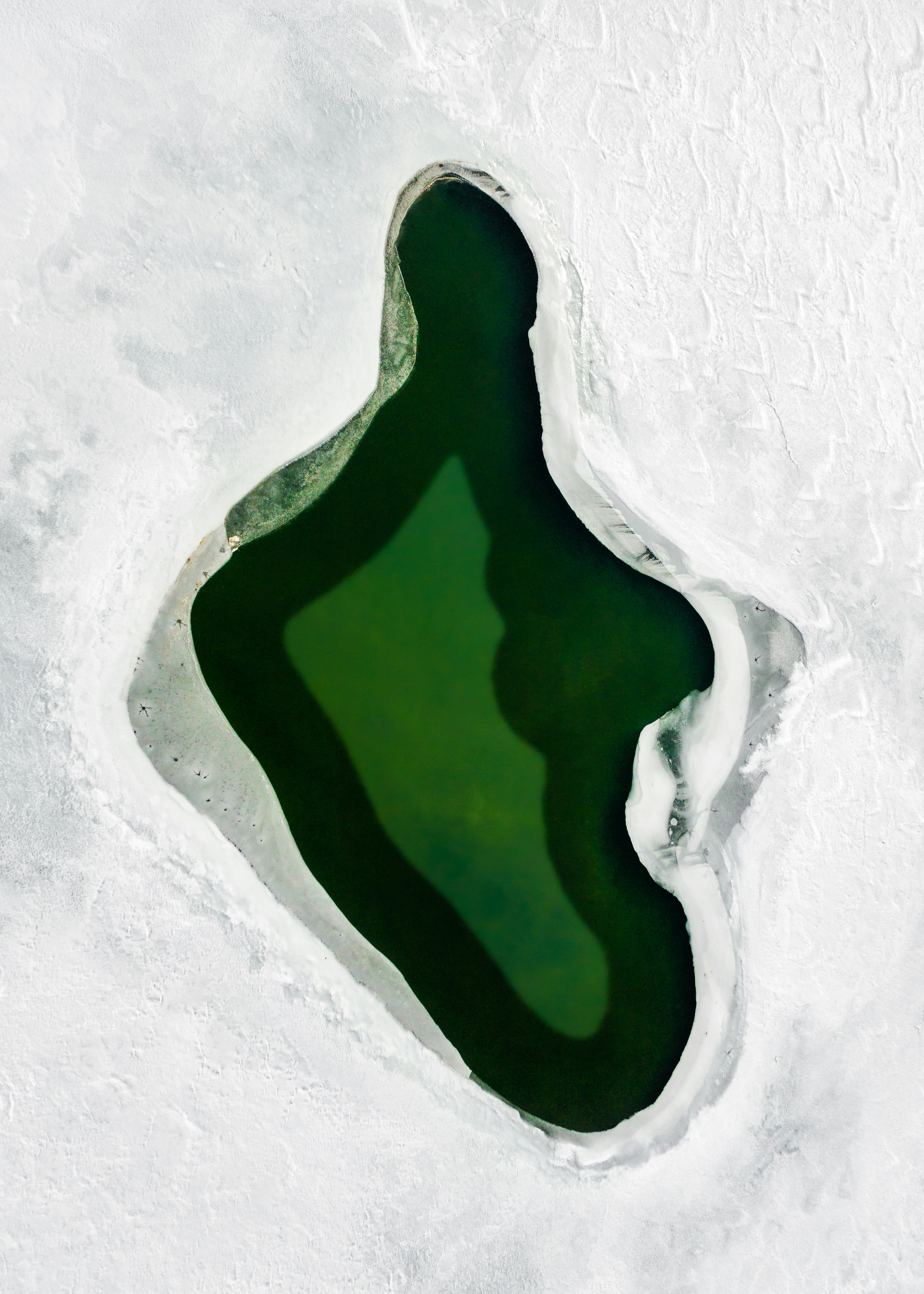 Aerial Human-shaped Unfrozen Lake