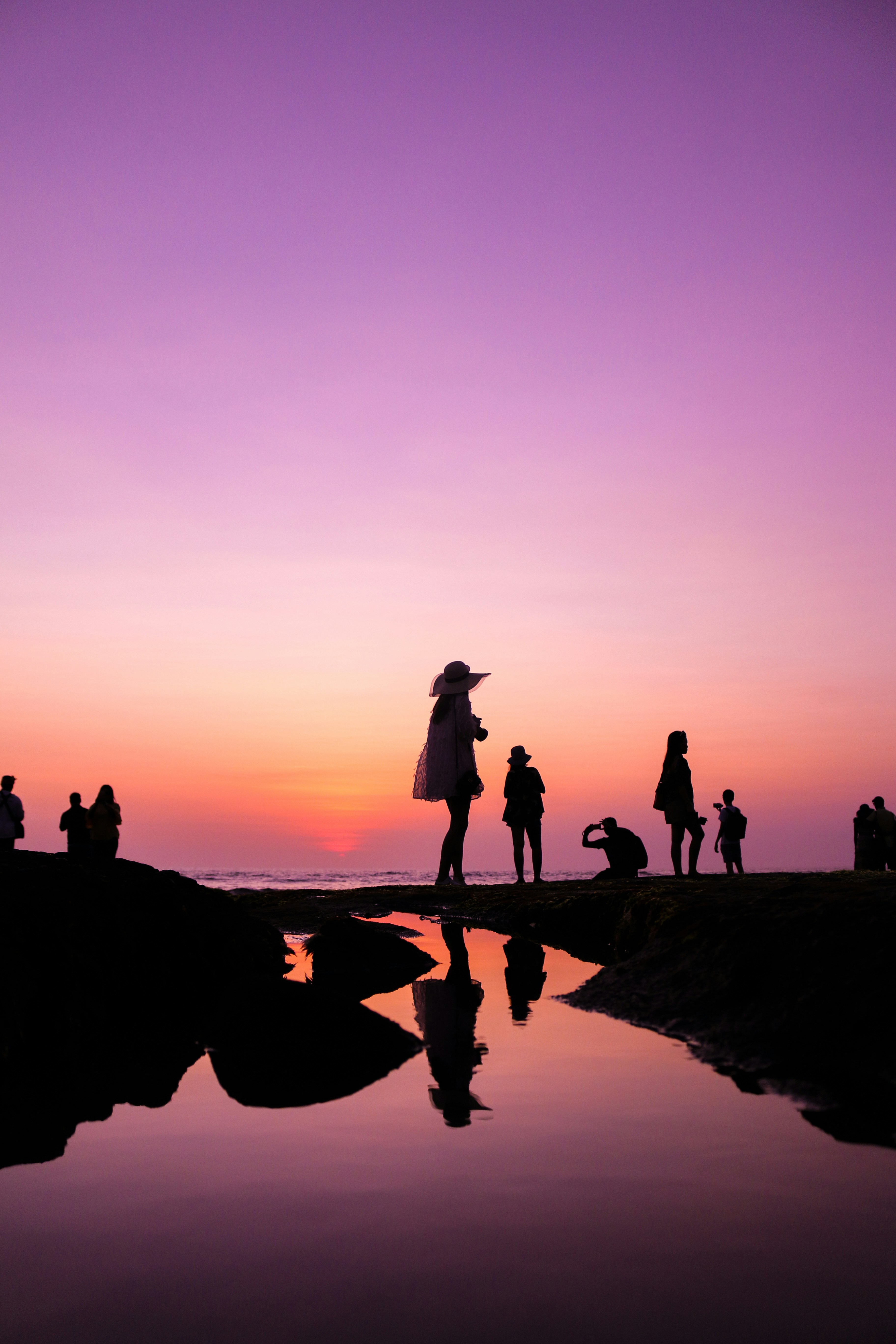 Seaside Sunset Crowd Silhouettes
