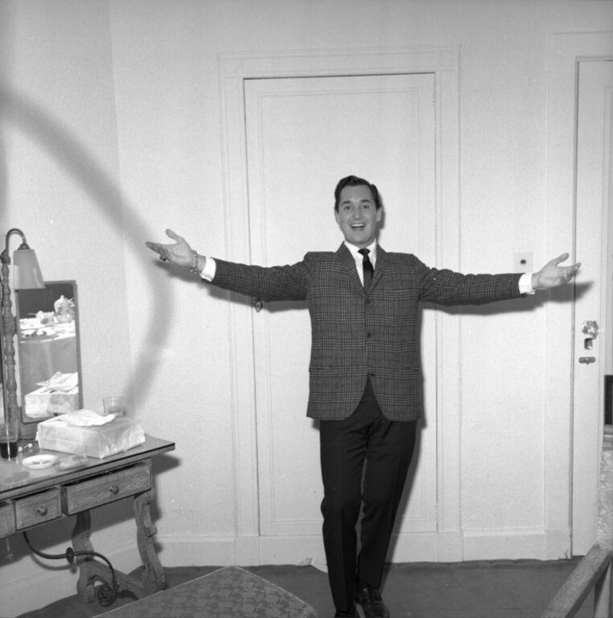 Smiling Man With Outstretched Arms