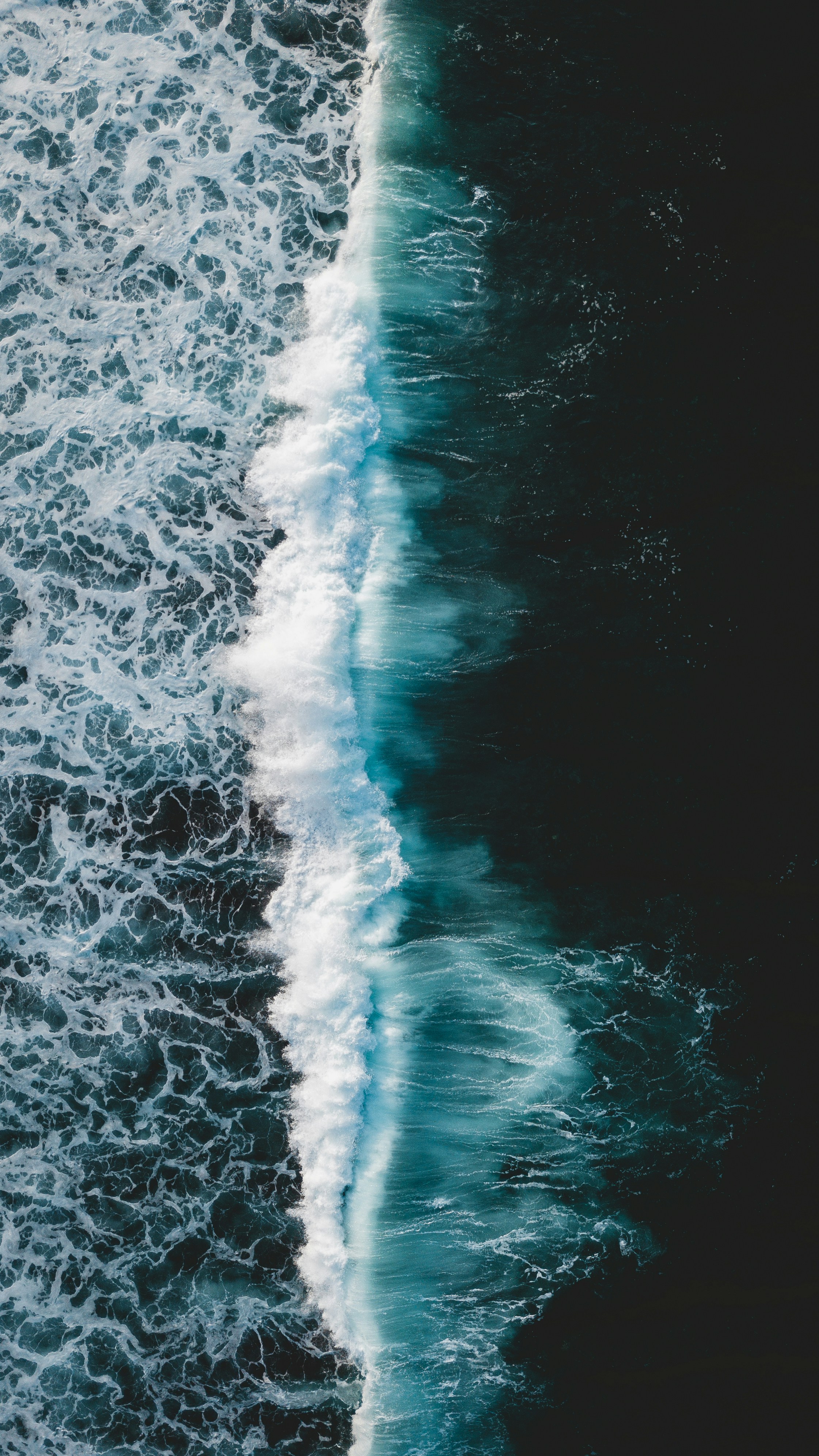 Aerial View of Breaking Ocean Wave