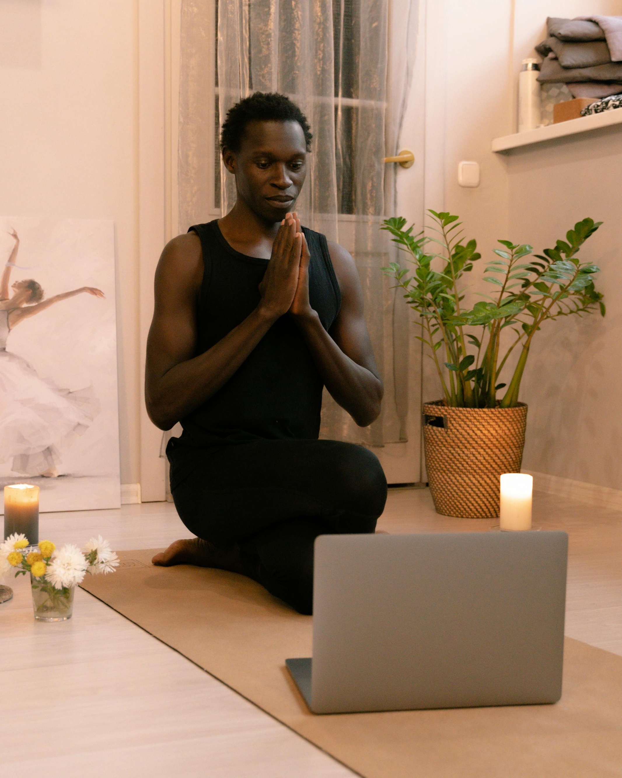 Man Doing Online Meditation At Home