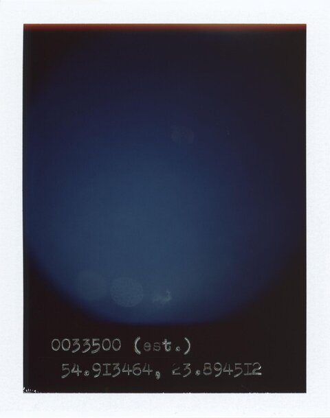 Polaroid with Handwritten Coordinates