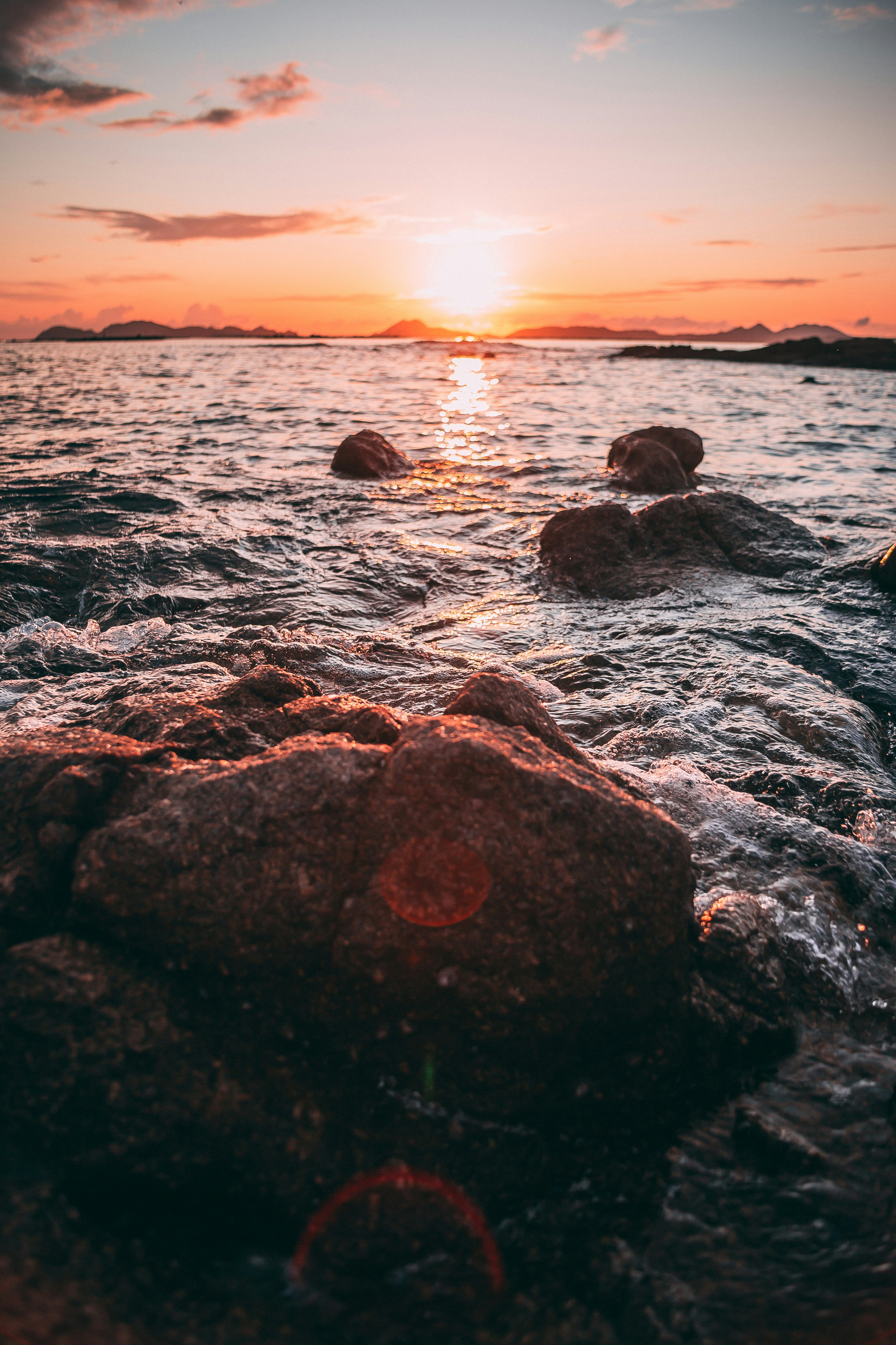 Sunset Over Rocky Seashore