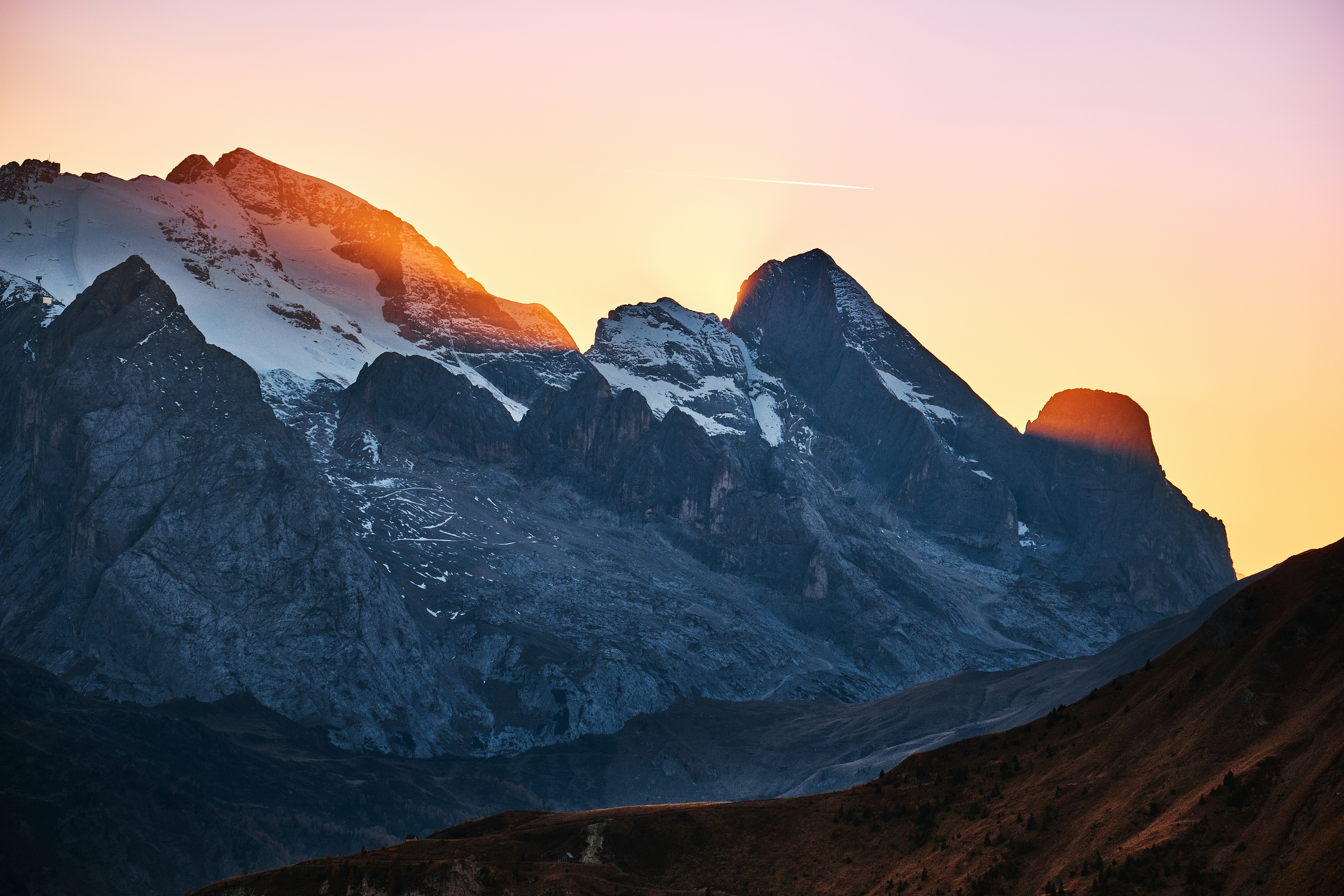 Sunset on Snow-Capped Mountains