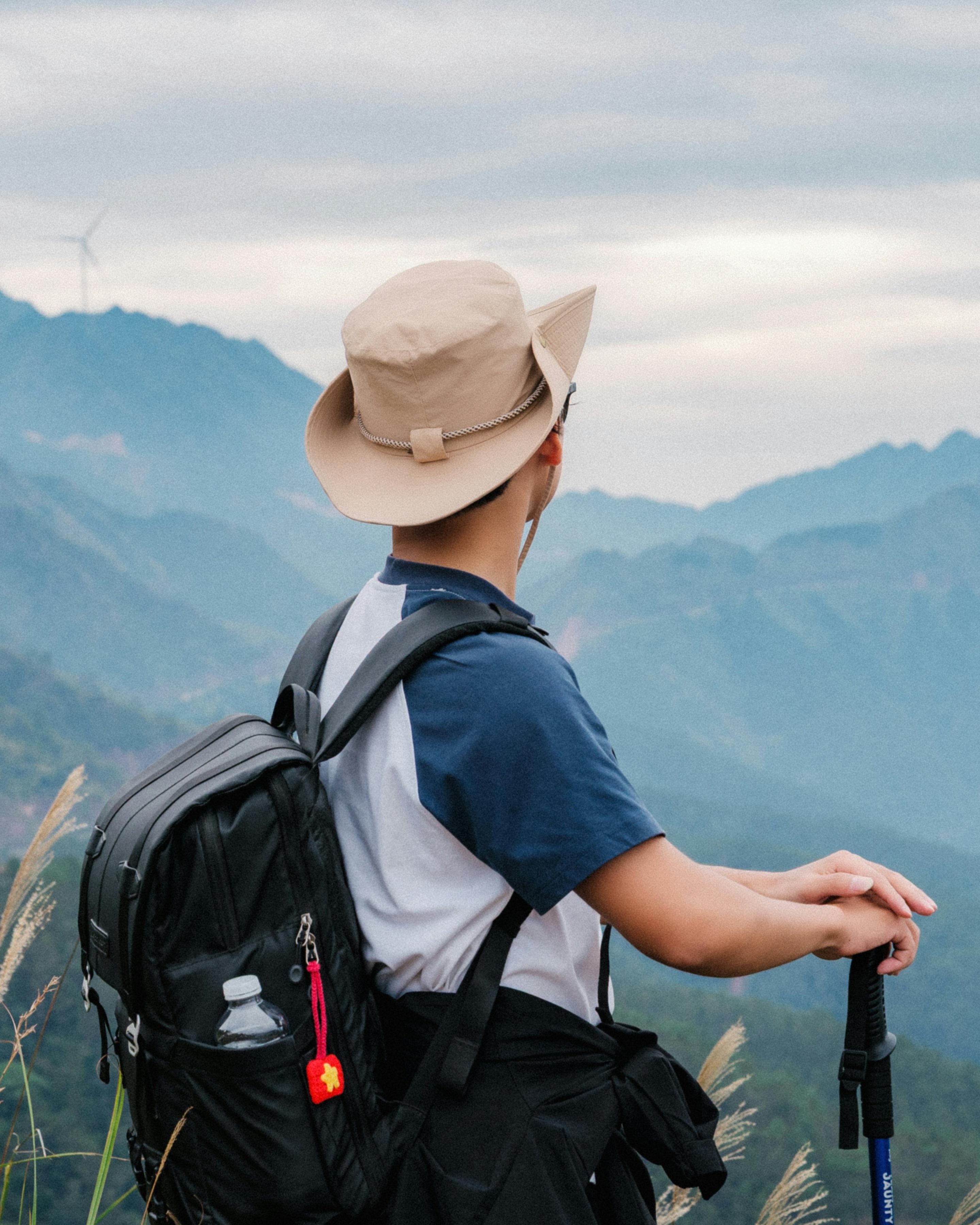 Hiker Overlooking Mountain Range