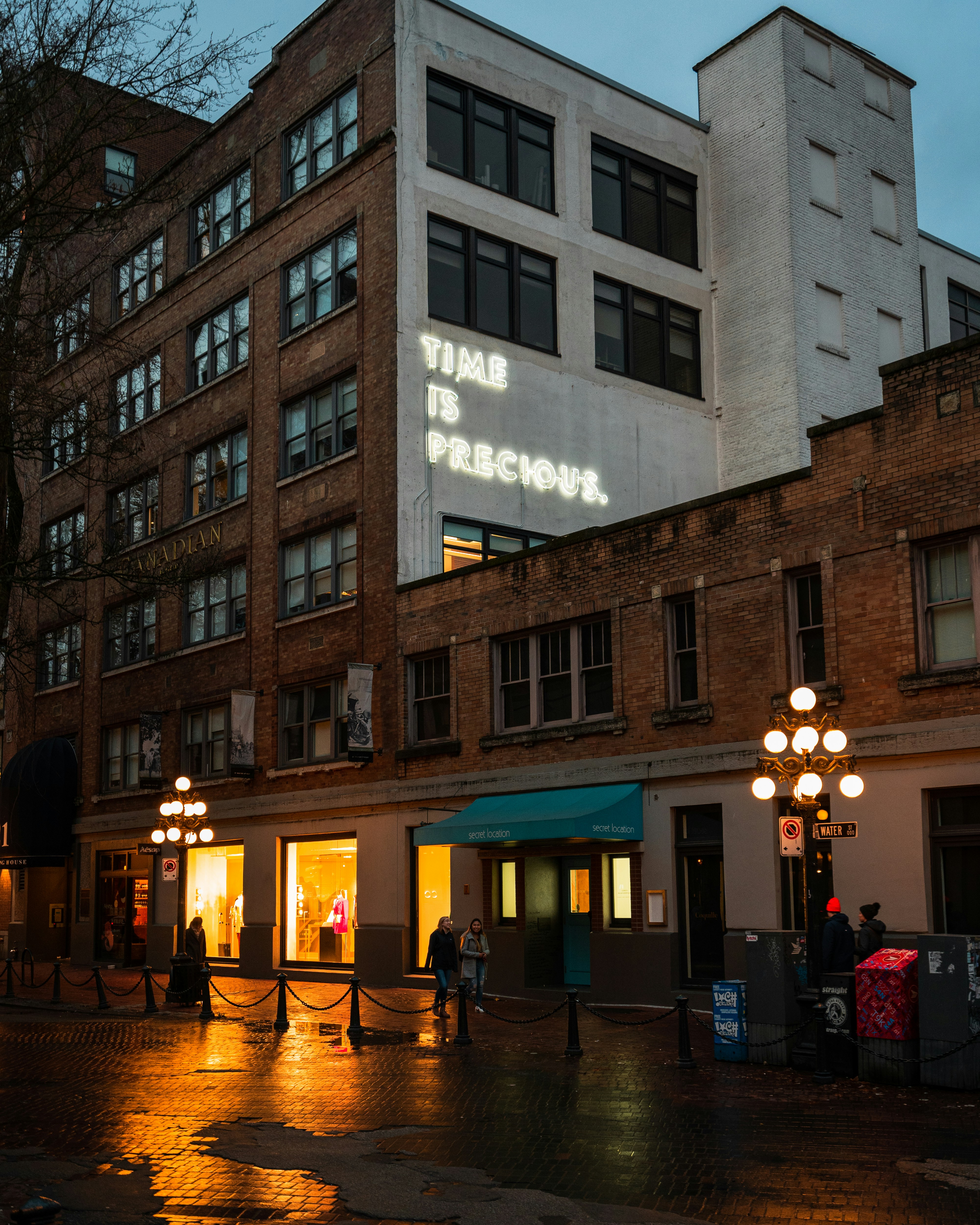 Dusk City Street With Neon Sign