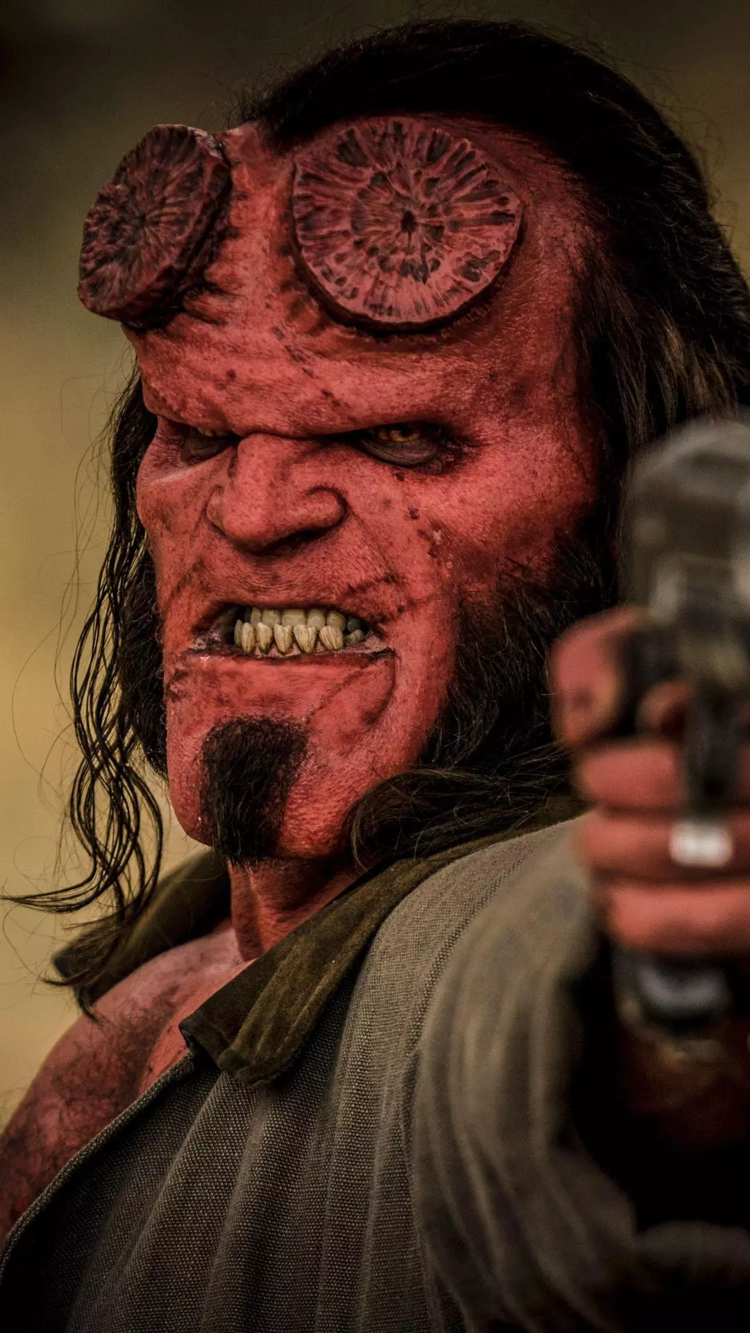 Hellboy Aiming a Handgun