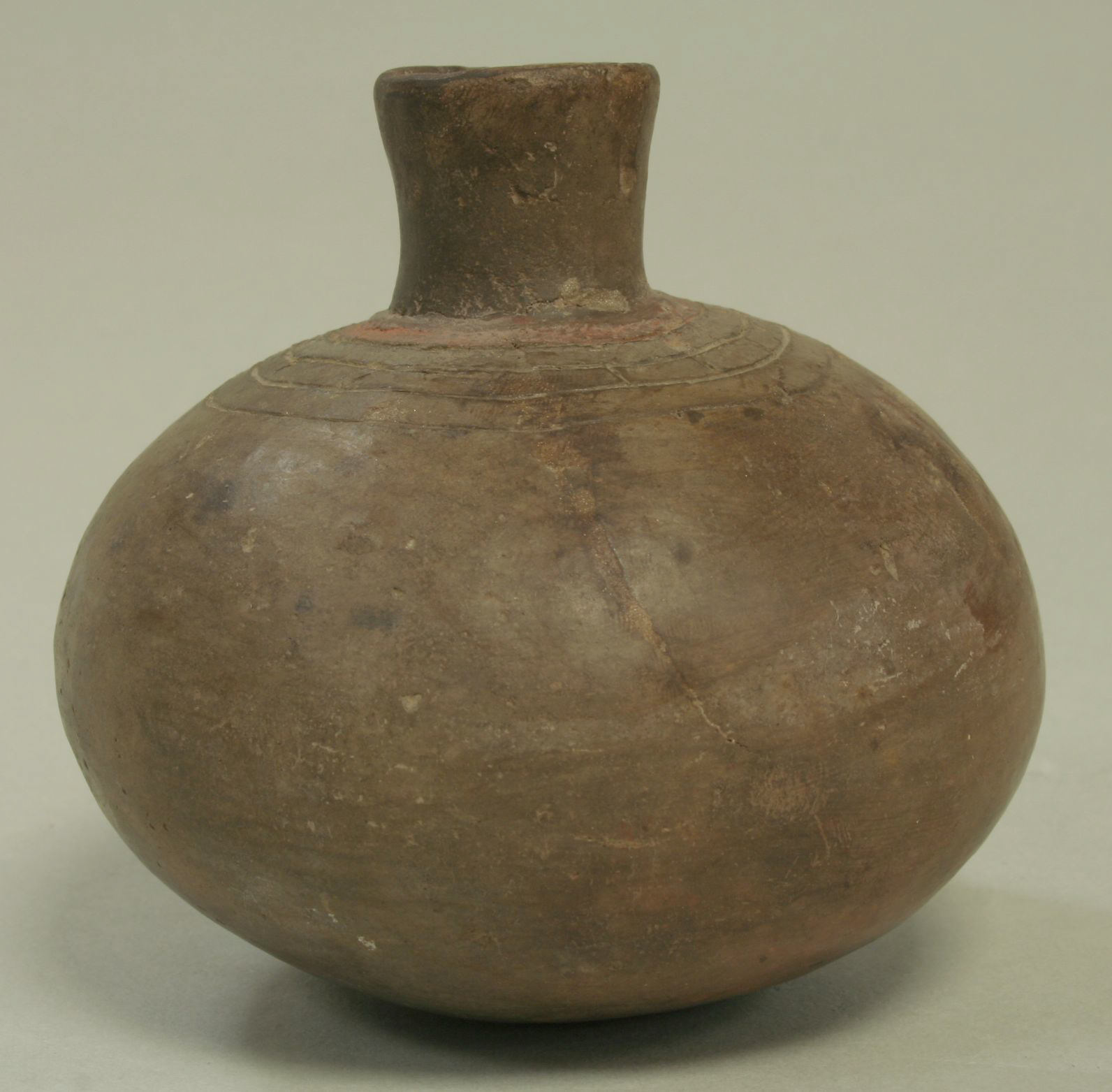 Ancient Brown Clay Bottle
