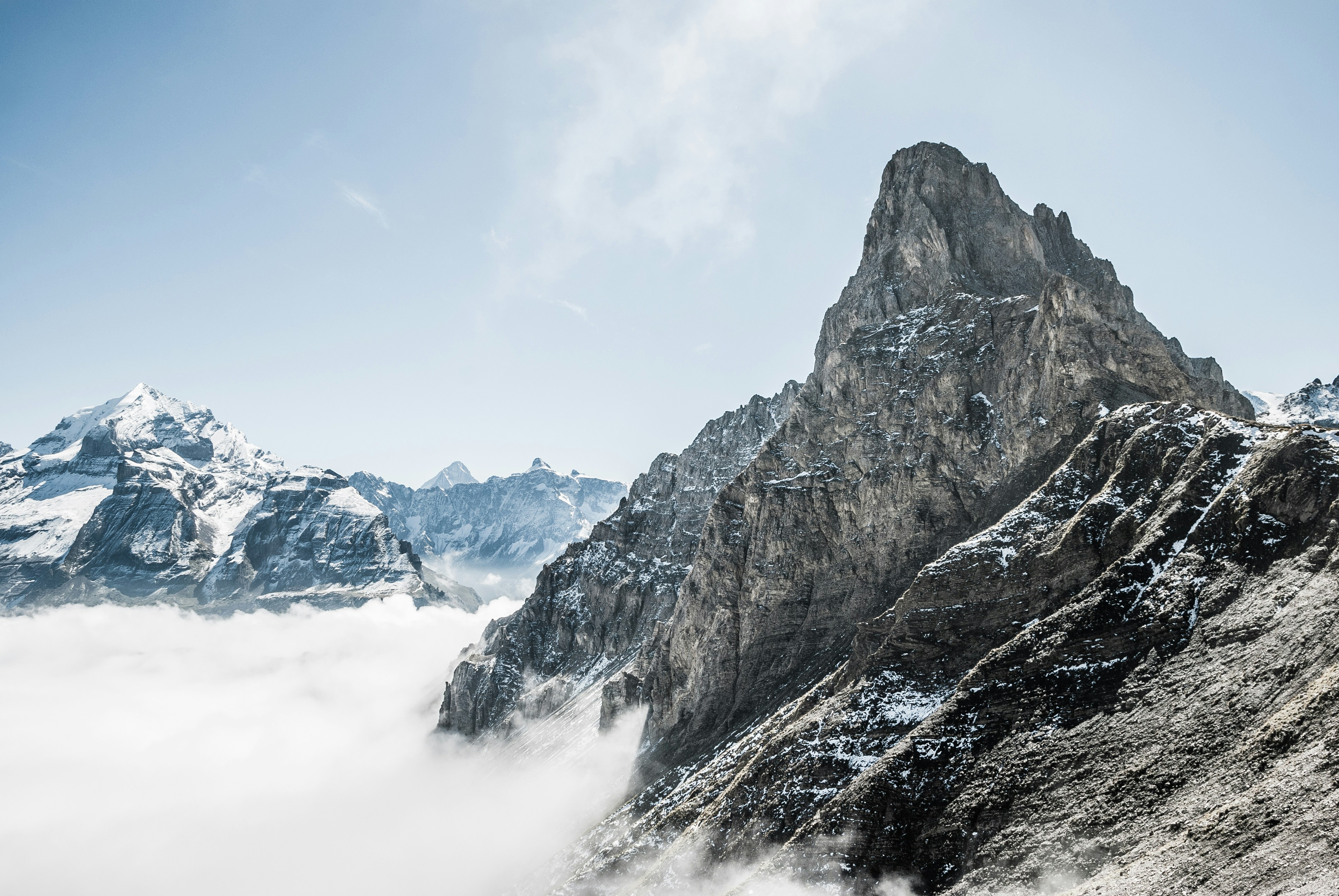 Snow-capped Peaks Above Cloud Sea