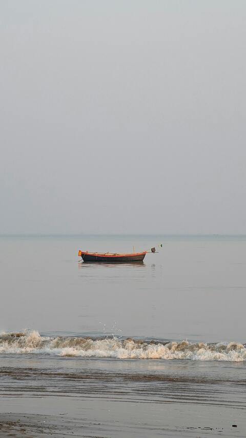 Lone Fishing Boat on Calm Sea