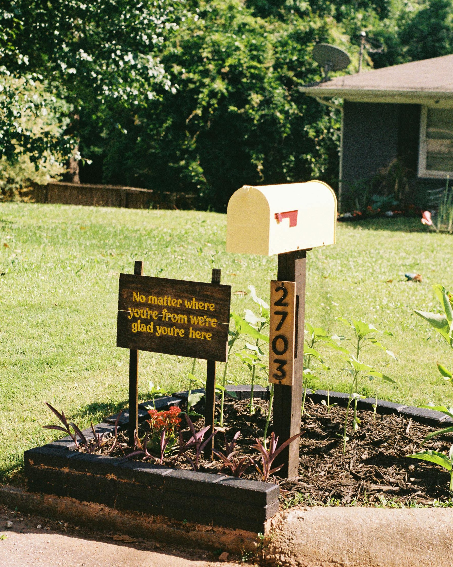 Welcome Sign by Residential Mailbox