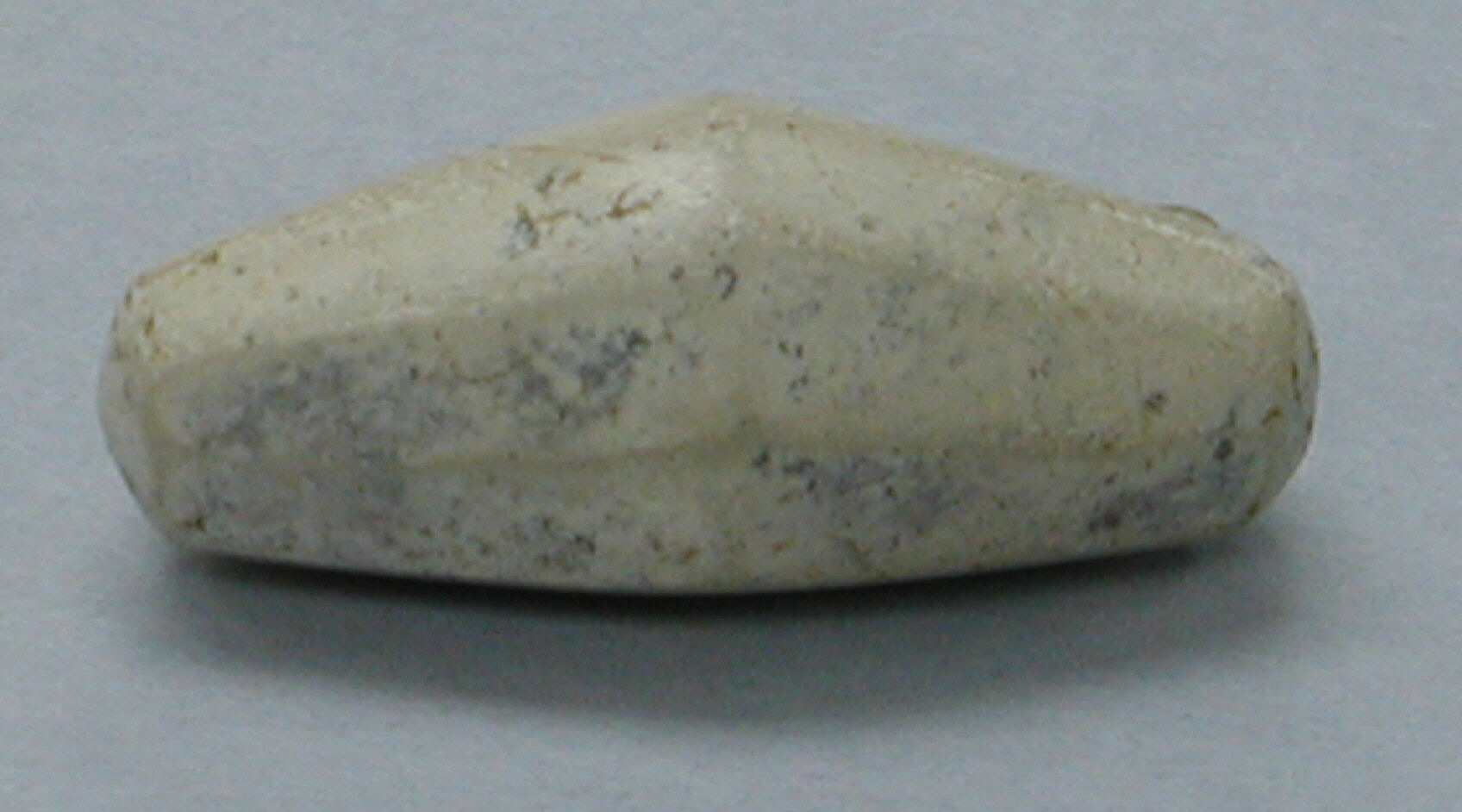 Elongated Polished Stone Artifact