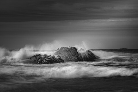 Waves Crashing on Coastal Rocks