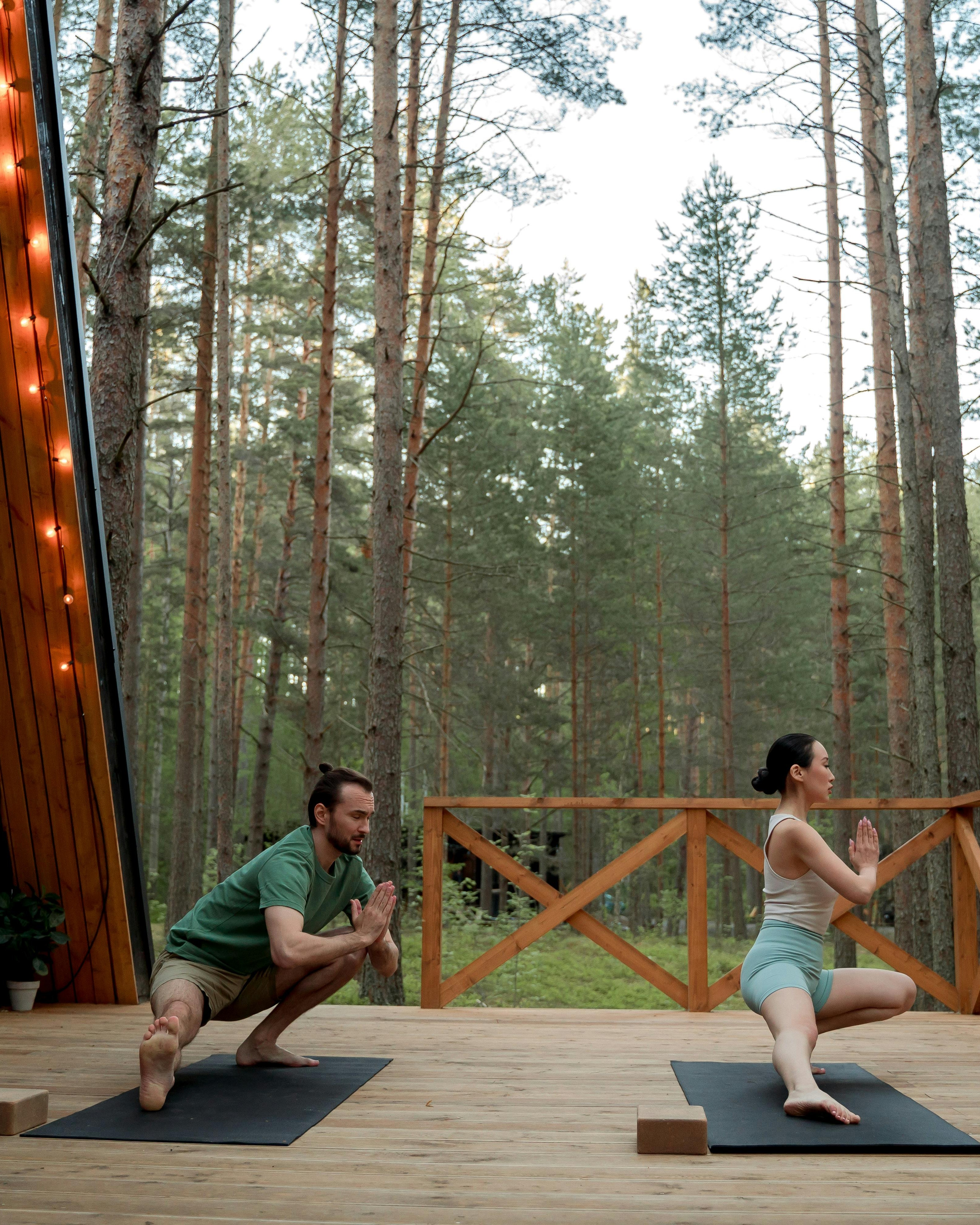 Two People Doing Outdoor Yoga