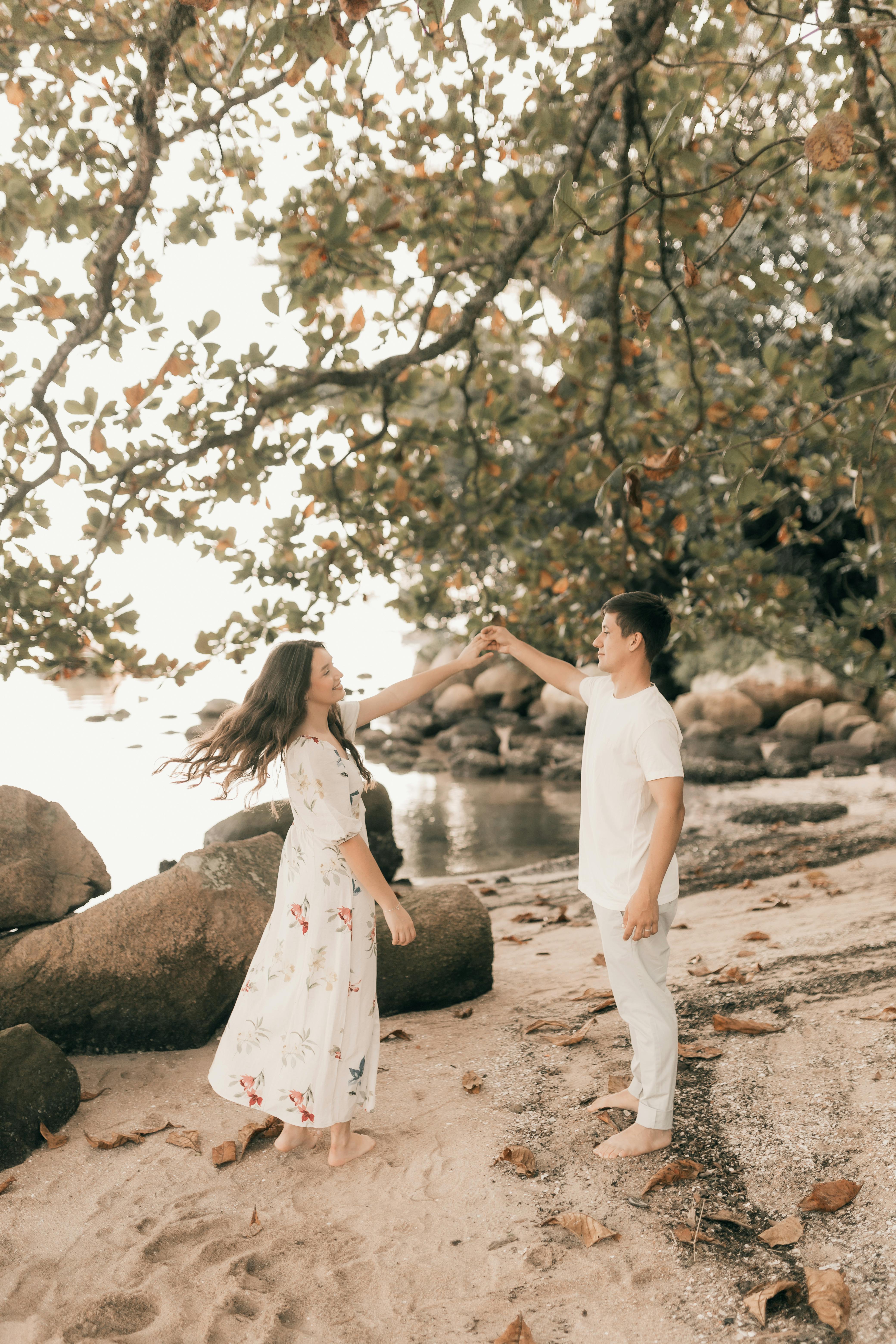 Couple Dancing on Sandy Beach