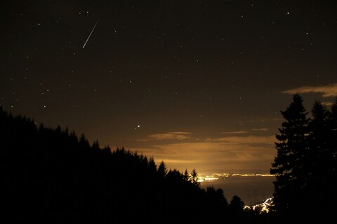 Meteor Streak Across Night Sky
