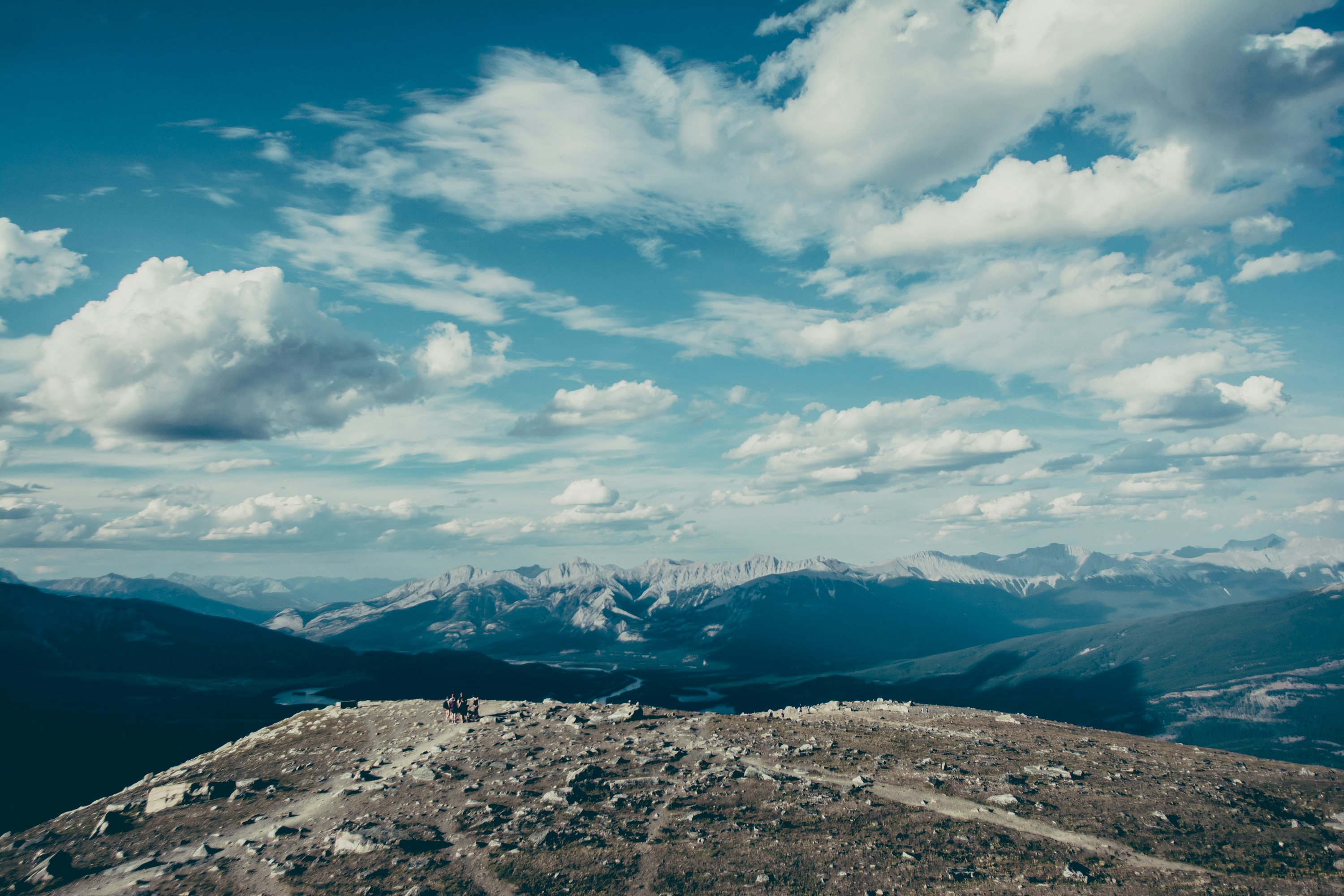 Hikers on Mountain Peak Summit