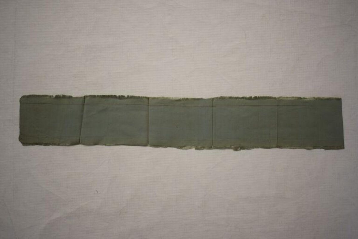 Folded Green Fabric Strip