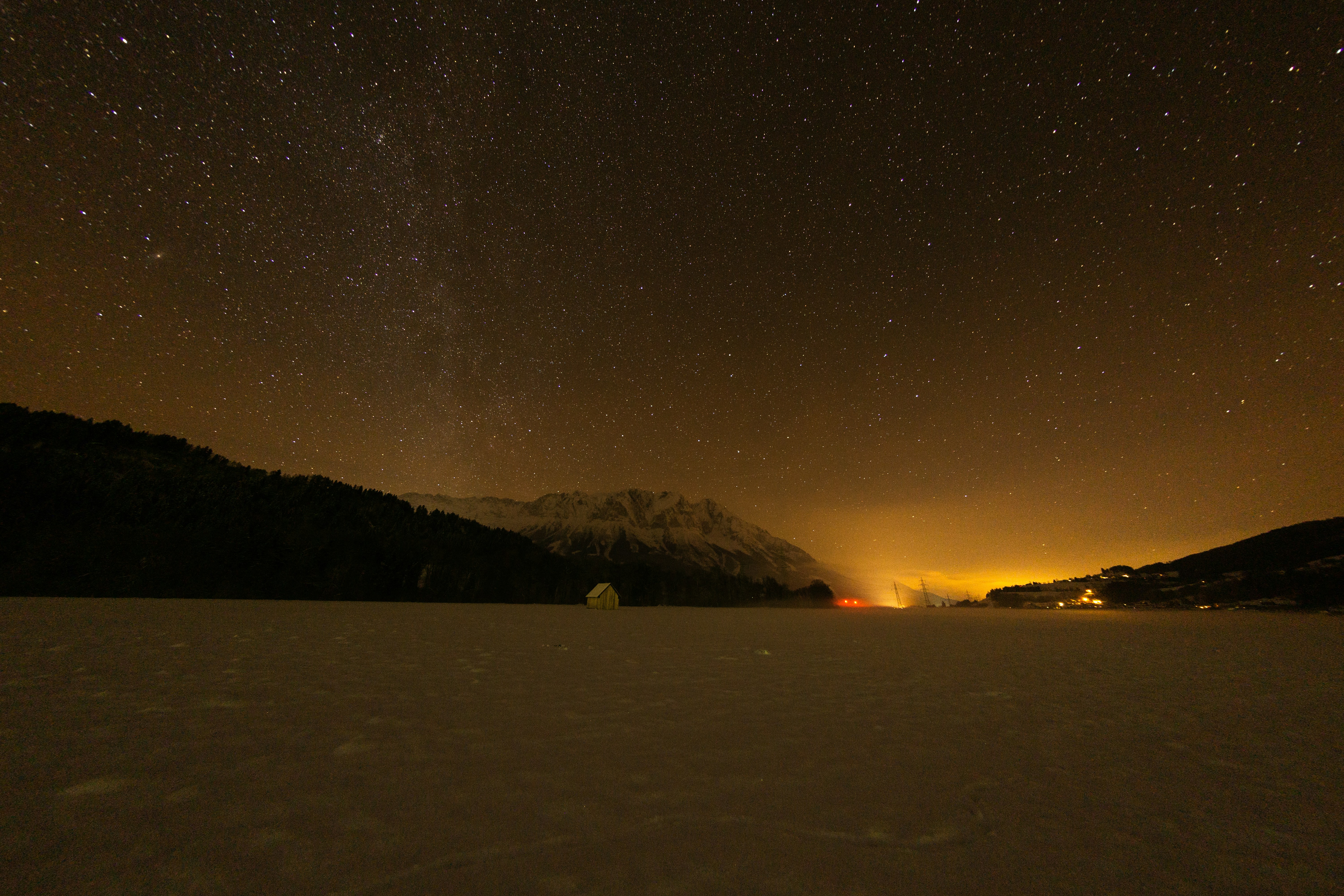 Starry Night Over Frozen Snow Field