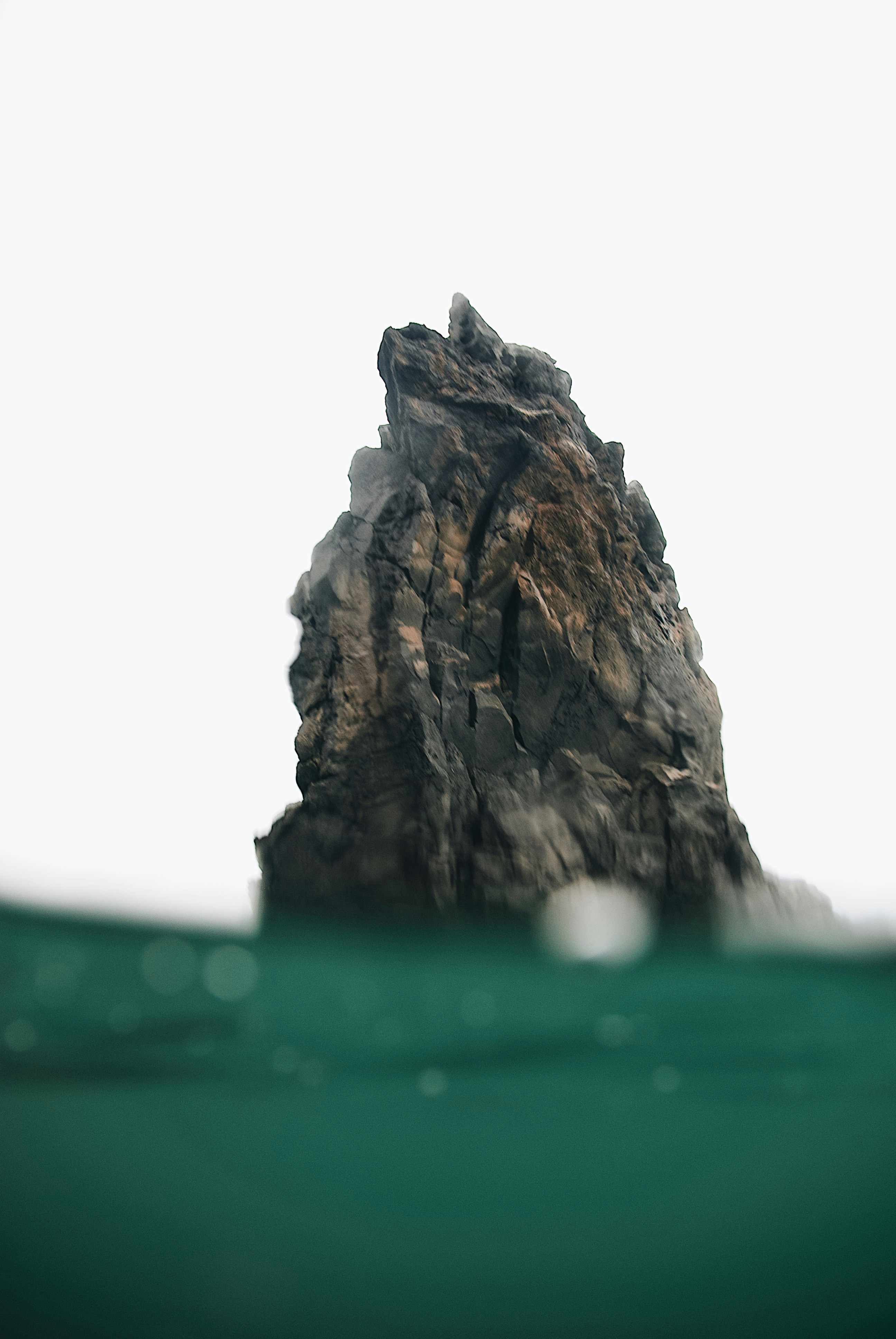 Sea Stack in Foggy Ocean
