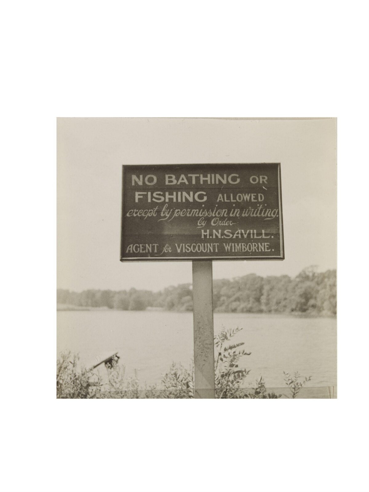 Vintage No Bathing Fishing Sign At Waterfront
