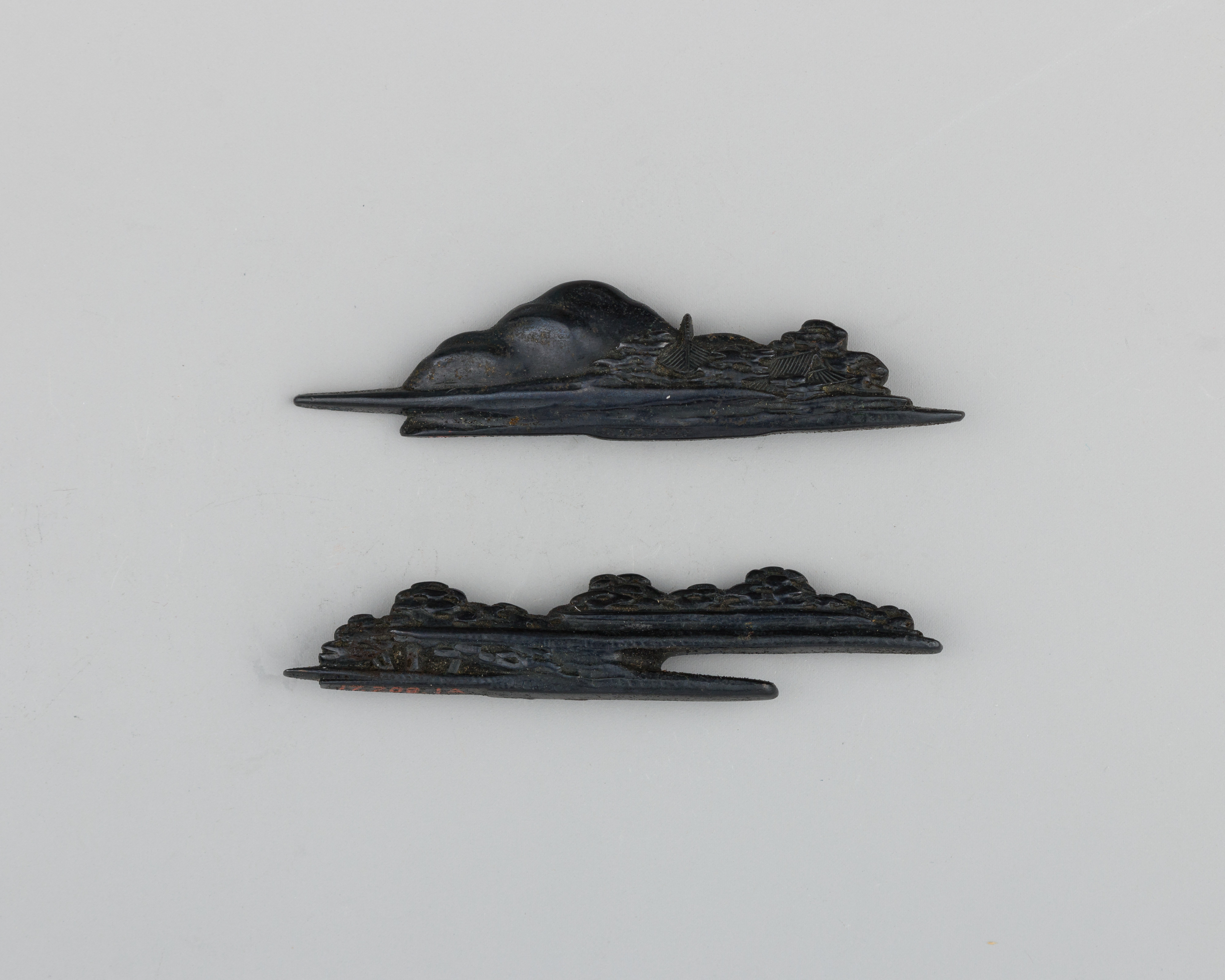 Pair of Carved Black Metal Landscape Fittings