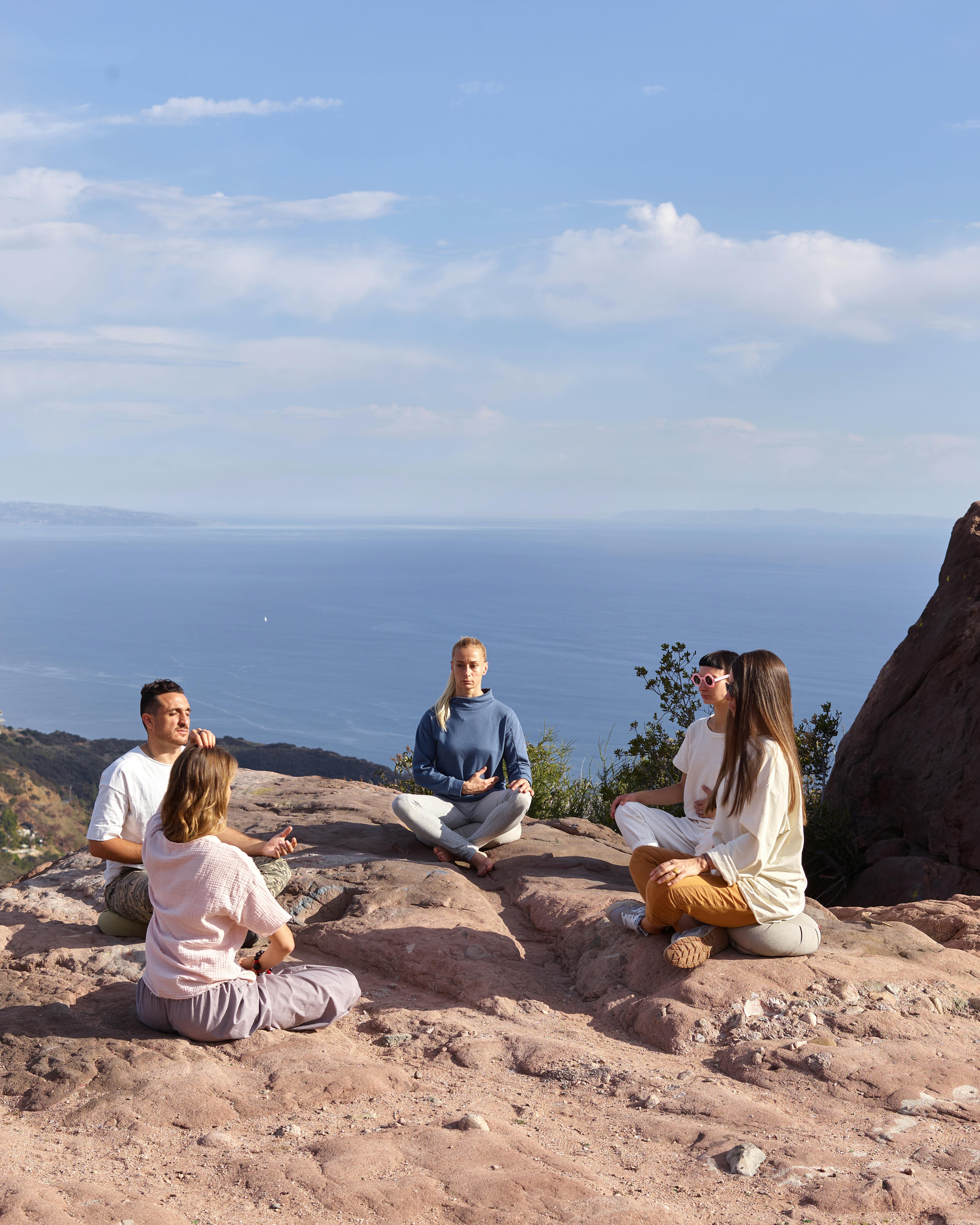 Group Meditation Overlooking the Ocean