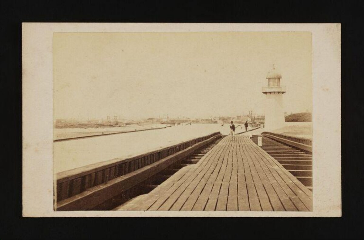 Vintage Wooden Pier with Lighthouse