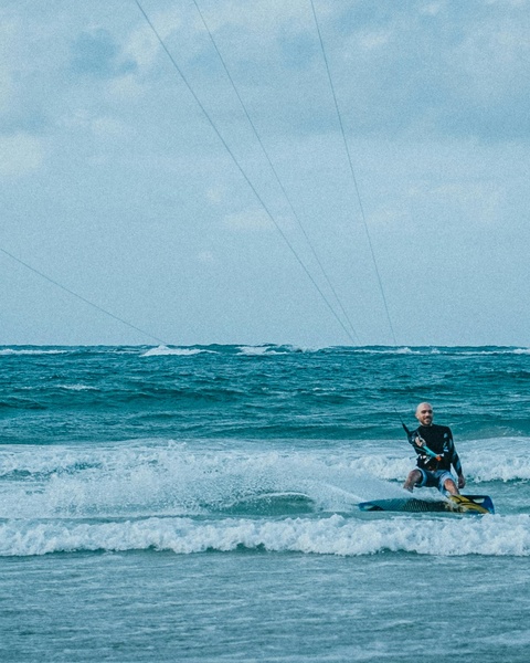 Kite Surfer Riding Ocean Waves