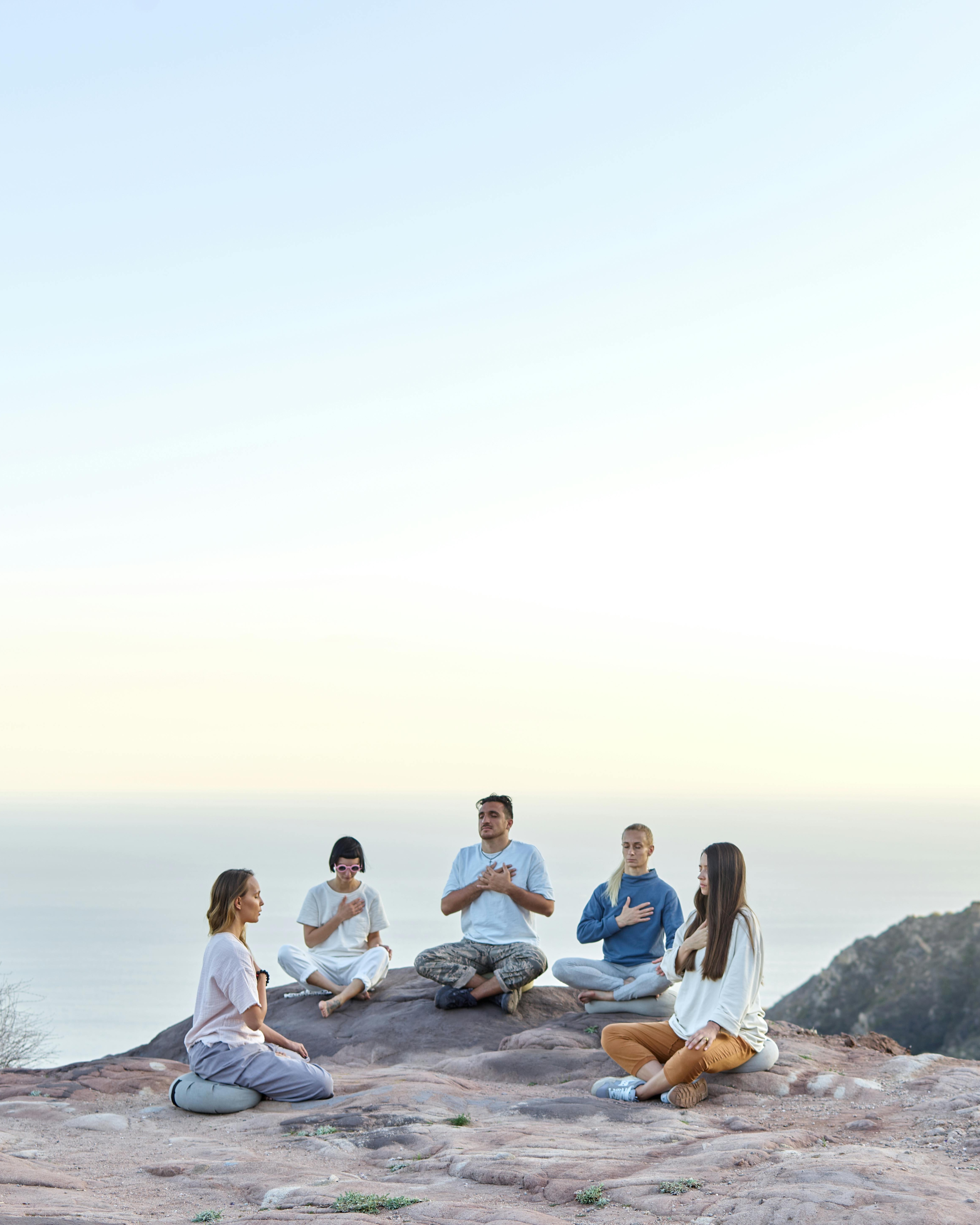 Group Meditation on Coastal Rocky Overlook