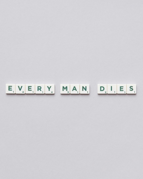 Scrabble Tiles Spelling Every Man Dies