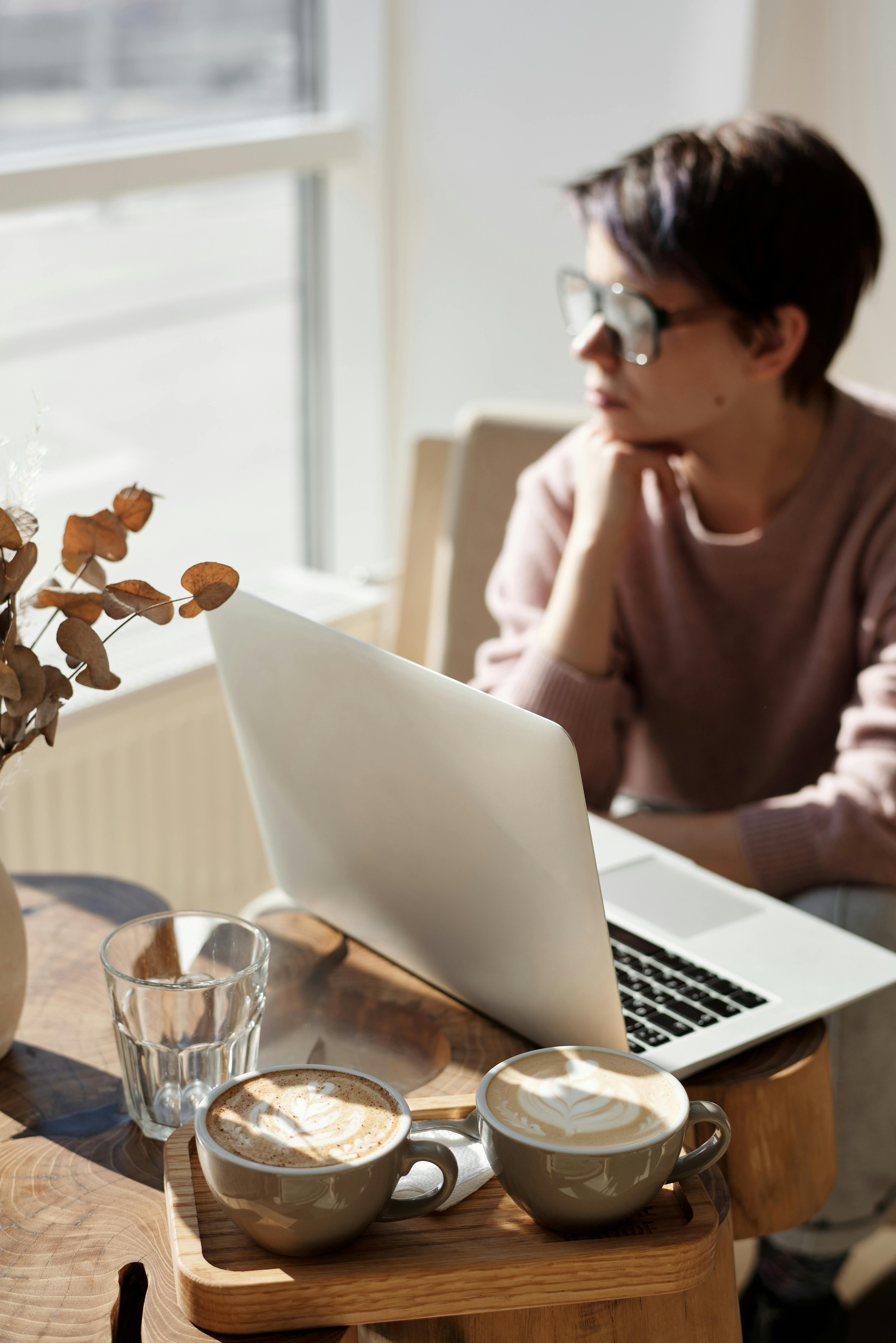 Woman Working Remotely on Laptop