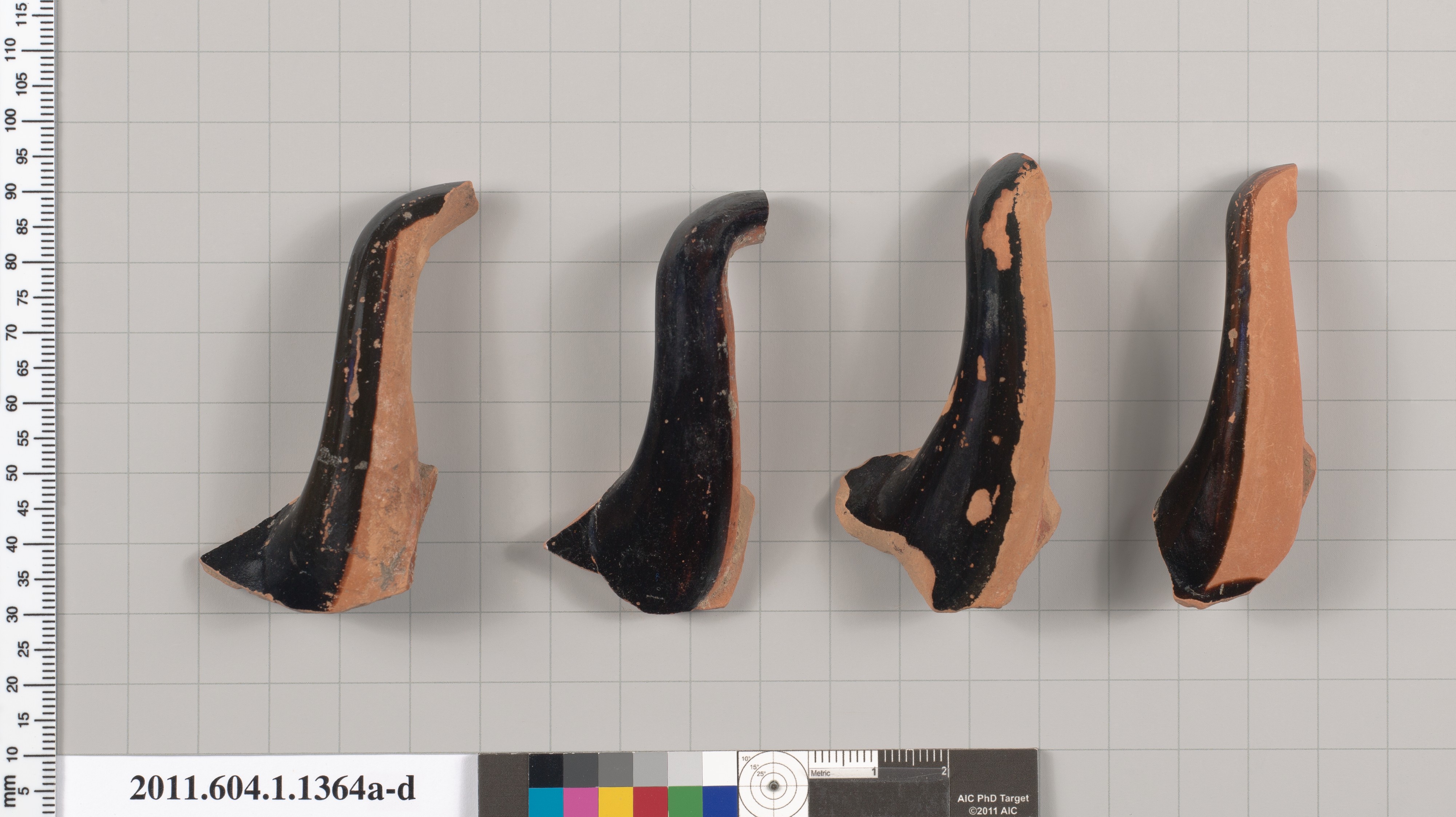 Four Ancient Pottery Handle Fragments