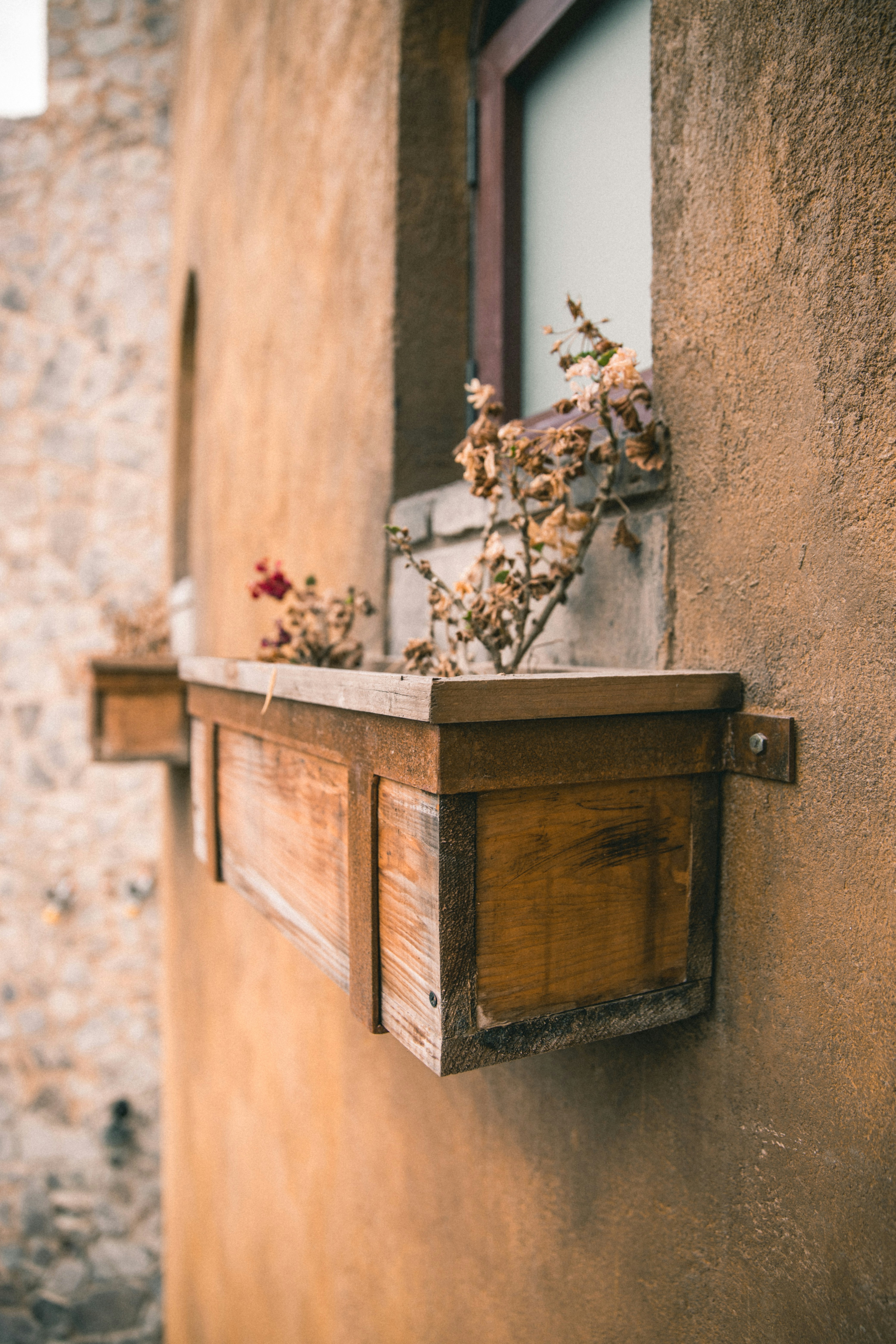 Wooden Window Planter on Exterior Wall