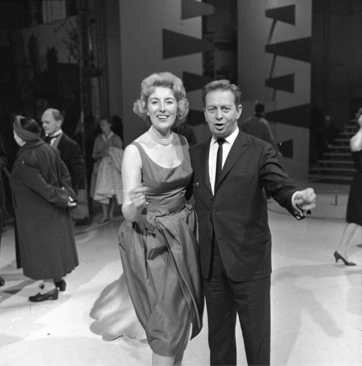 Smiling Man And Woman At Formal Event