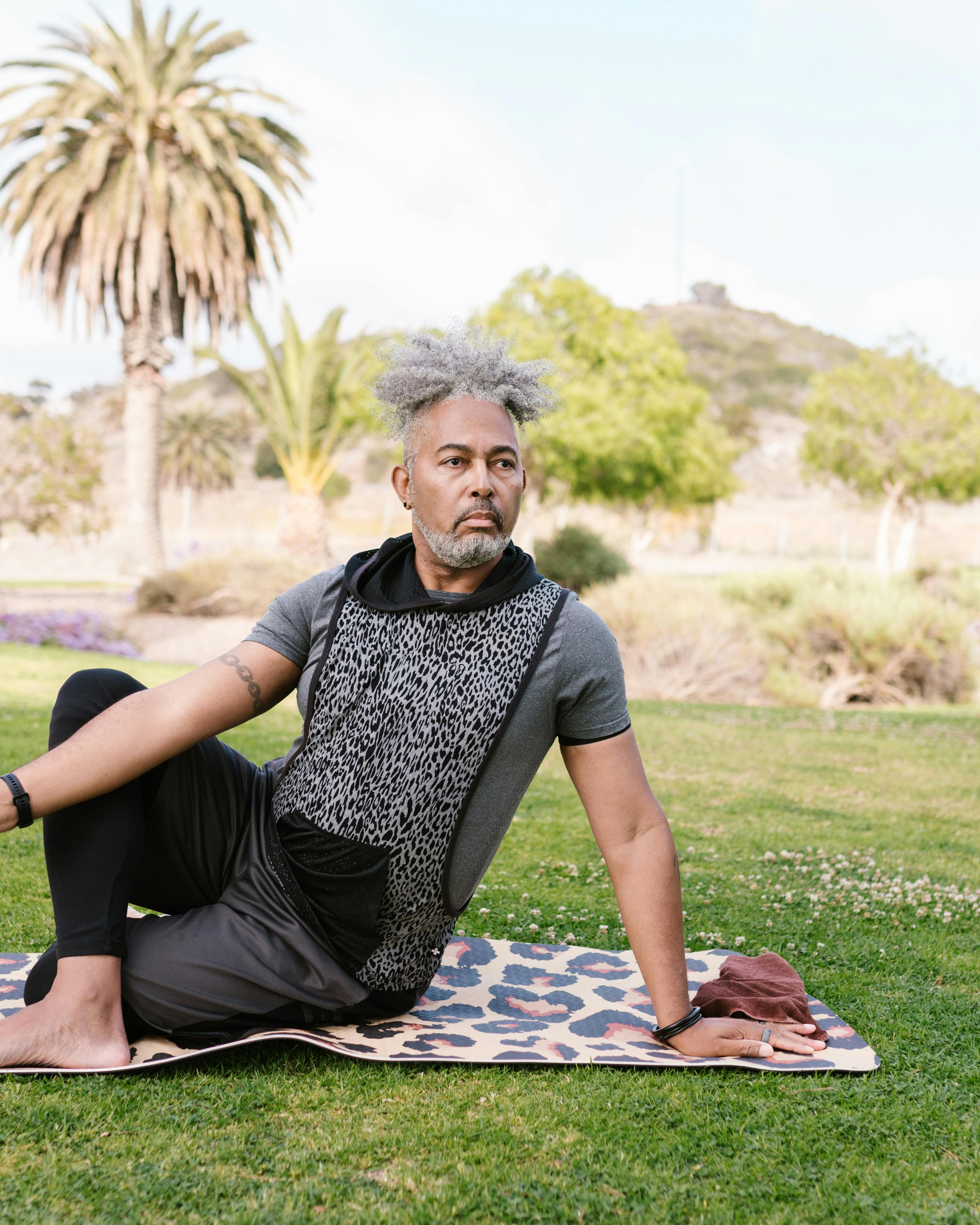 Man Practicing Yoga in Park