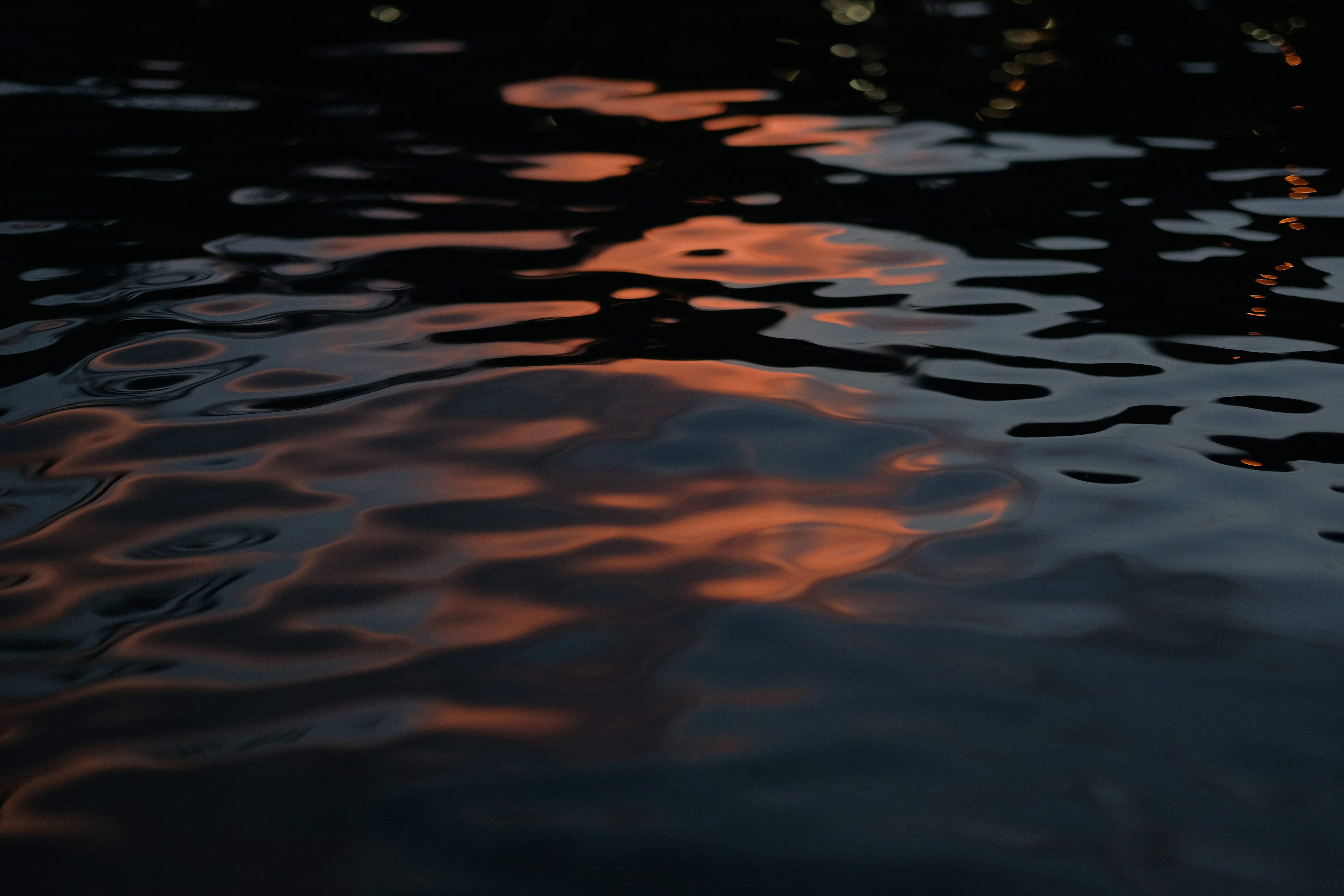 Sunset Reflection on Rippled Water