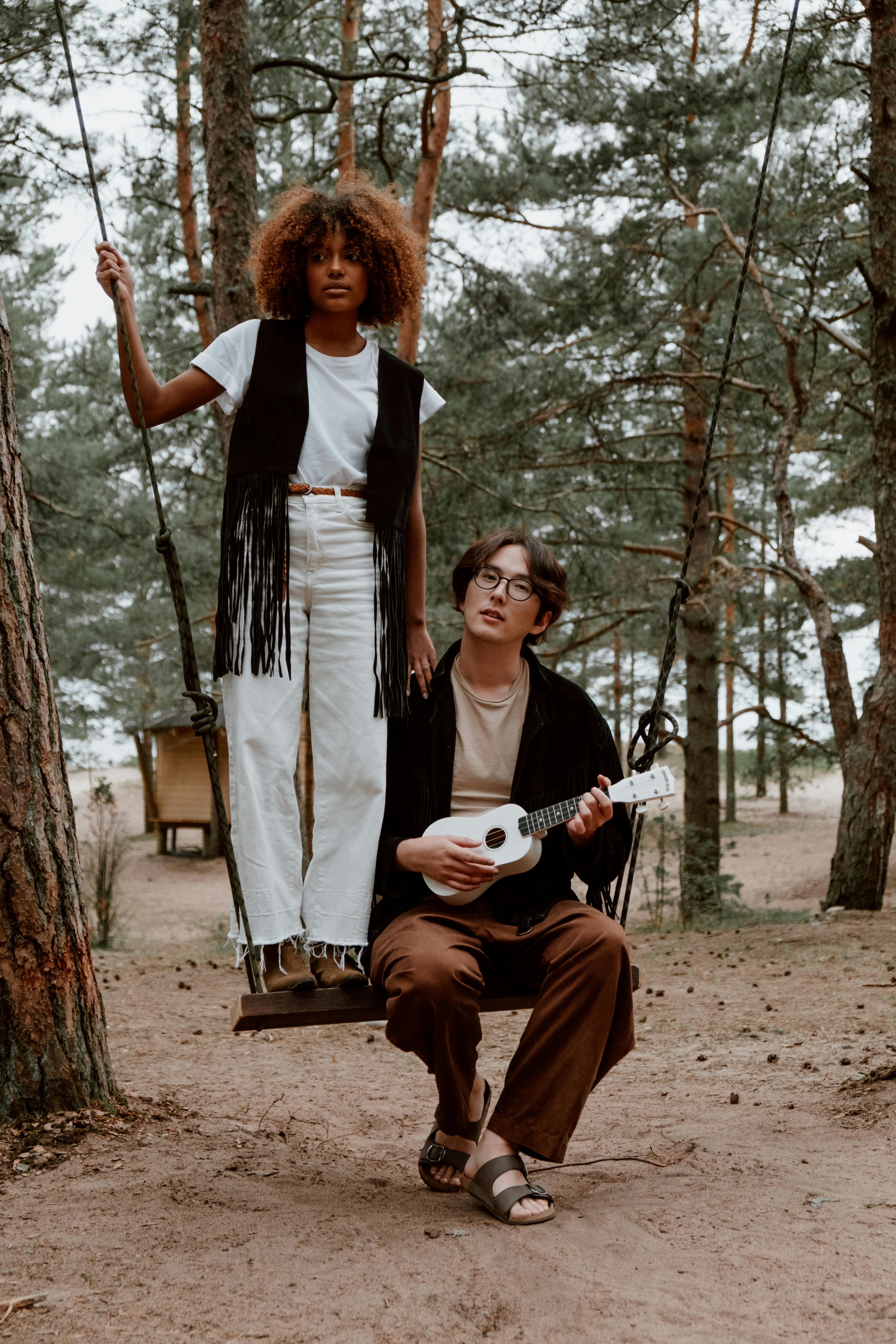 Two People on a Forest Swing