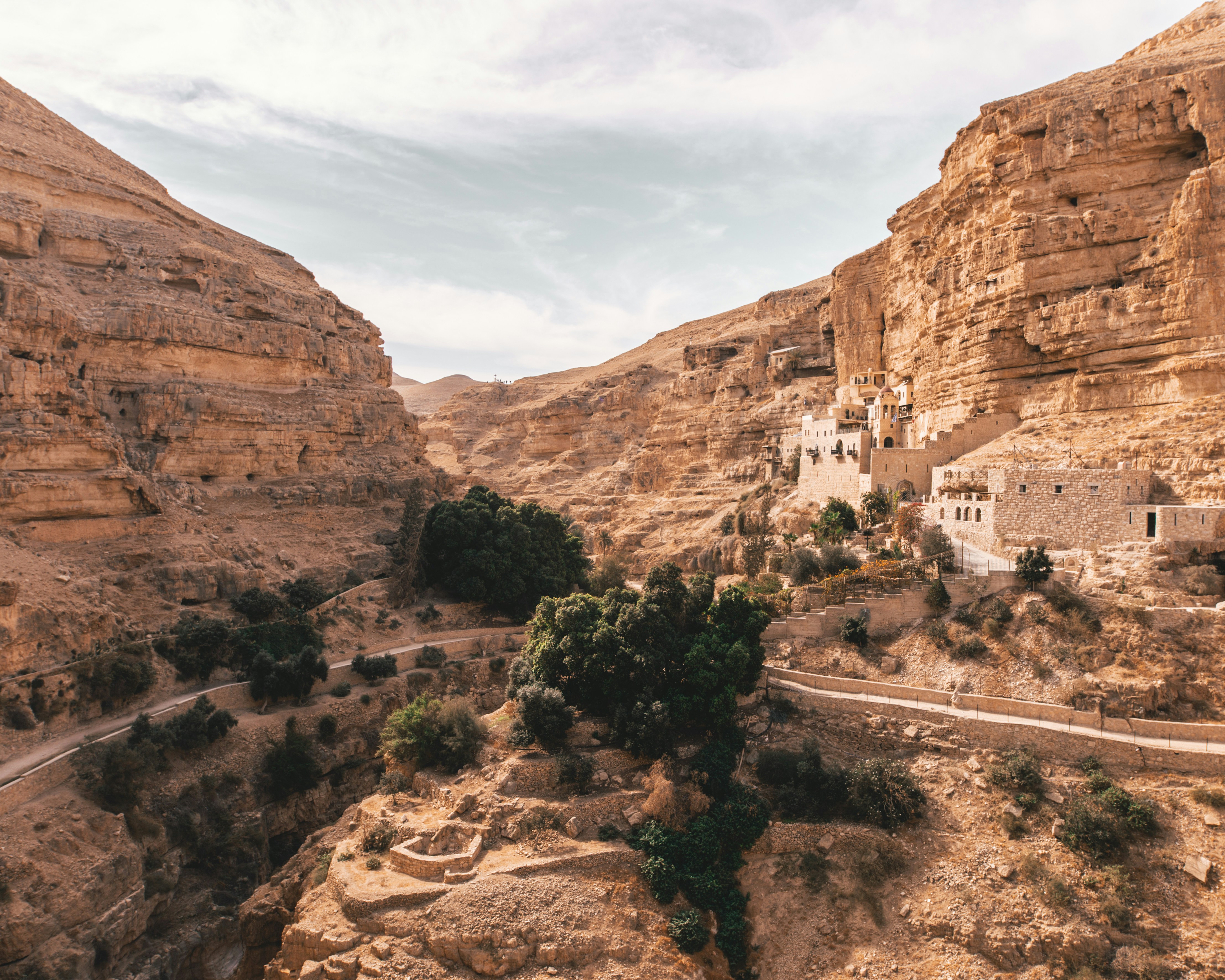 Cliffside Monastery in Desert Canyon