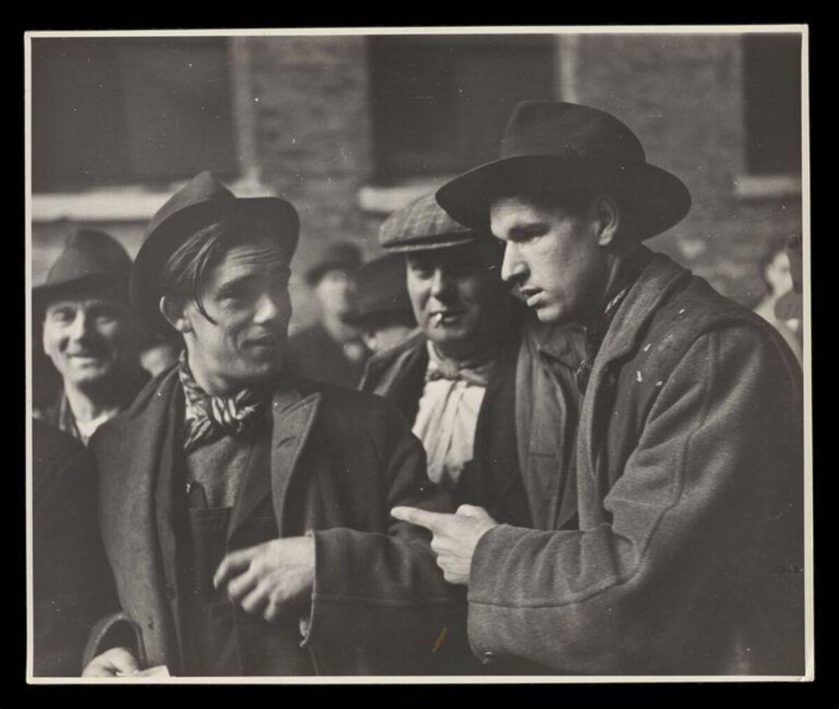 Group of Men in Discussion