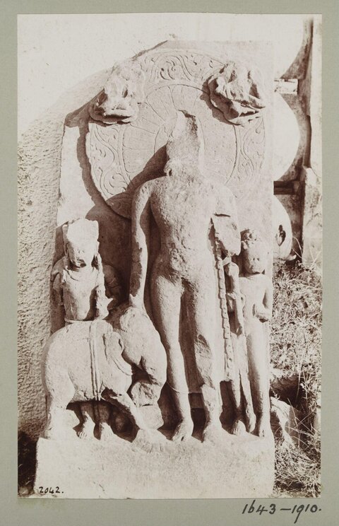 Ancient Stone Deity Relief Sculpture