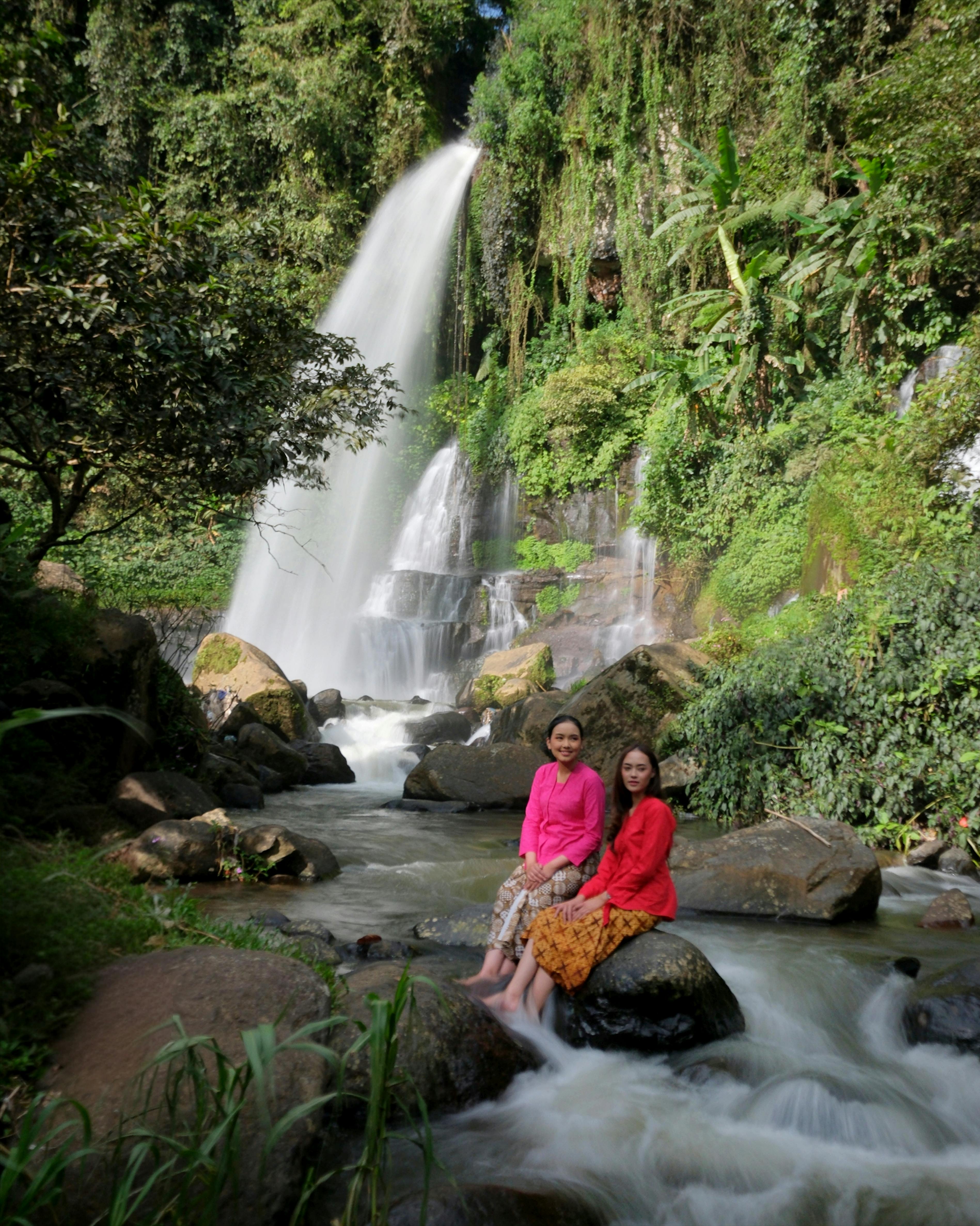 Two Women At Forest Waterfall