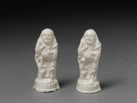 Pair of White Ceramic Buddha Figurines
