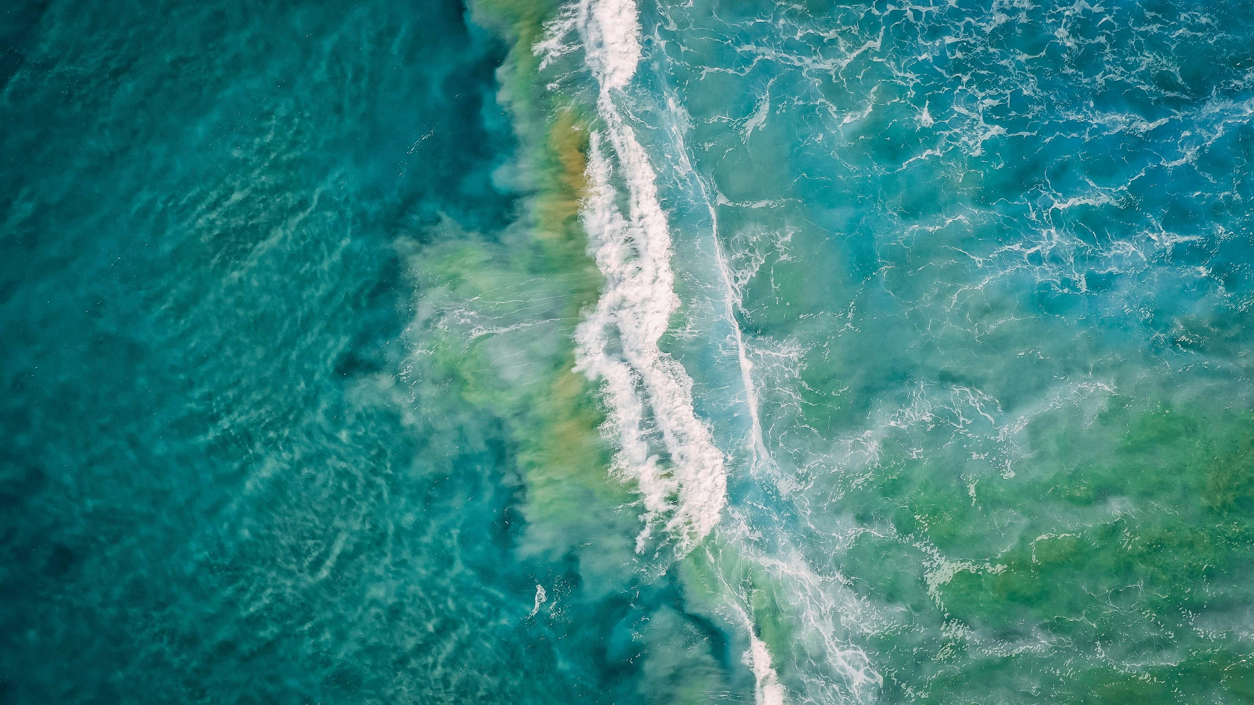 Aerial View of Breaking Ocean Wave